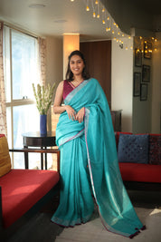 Sky Blue Plain Linen Saree With Magenta Tassels - SRSBPLS314