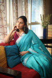 Sky Blue Plain Linen Saree With Magenta Tassels - SRSBPLS314