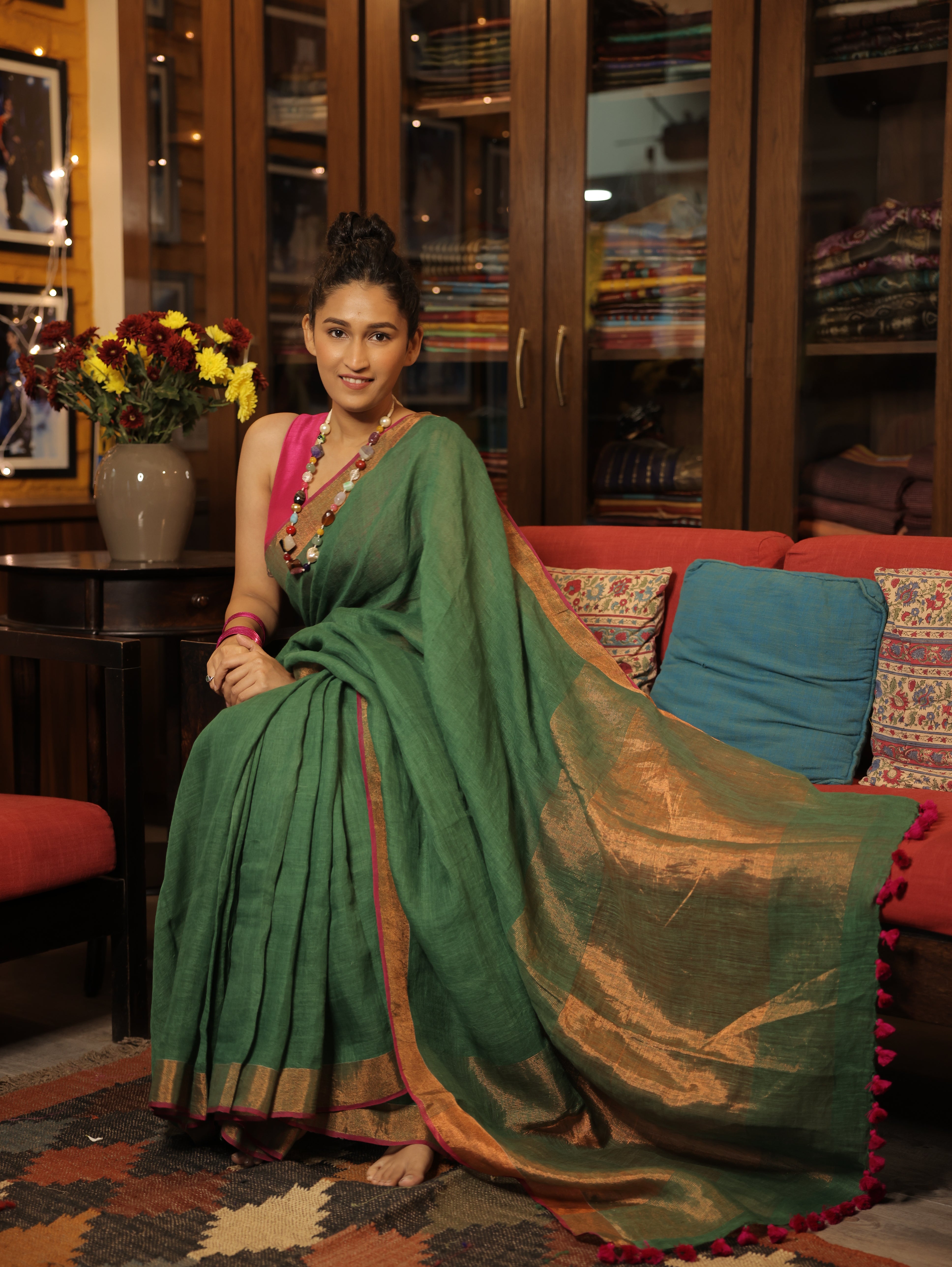 Green Plain Linen Saree With Pink Tassels - SRGPLS292