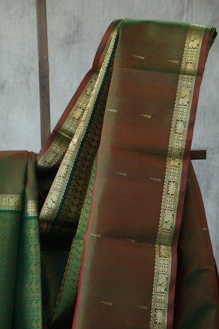 Green Kanjeevaram Silk Saree with Golden Buttas - SRGKSS573