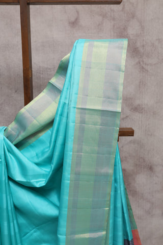 Aqua Soft Silk Saree With Zari Border And Floral Pallu Design - SRASSS170