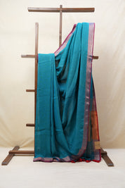 Teal Blue Plain Linen Saree With Green Tassels - SRTBPLS324