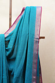 Teal Blue Plain Linen Saree With Green Tassels - SRTBPLS324