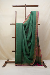 Green Plain Linen Saree With Pink Tassels - SRGPLS322