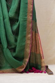 Green Plain Linen Saree With Pink Tassels - SRGPLS322