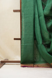 Green Plain Linen Saree With Pink Tassels - SRGPLS322