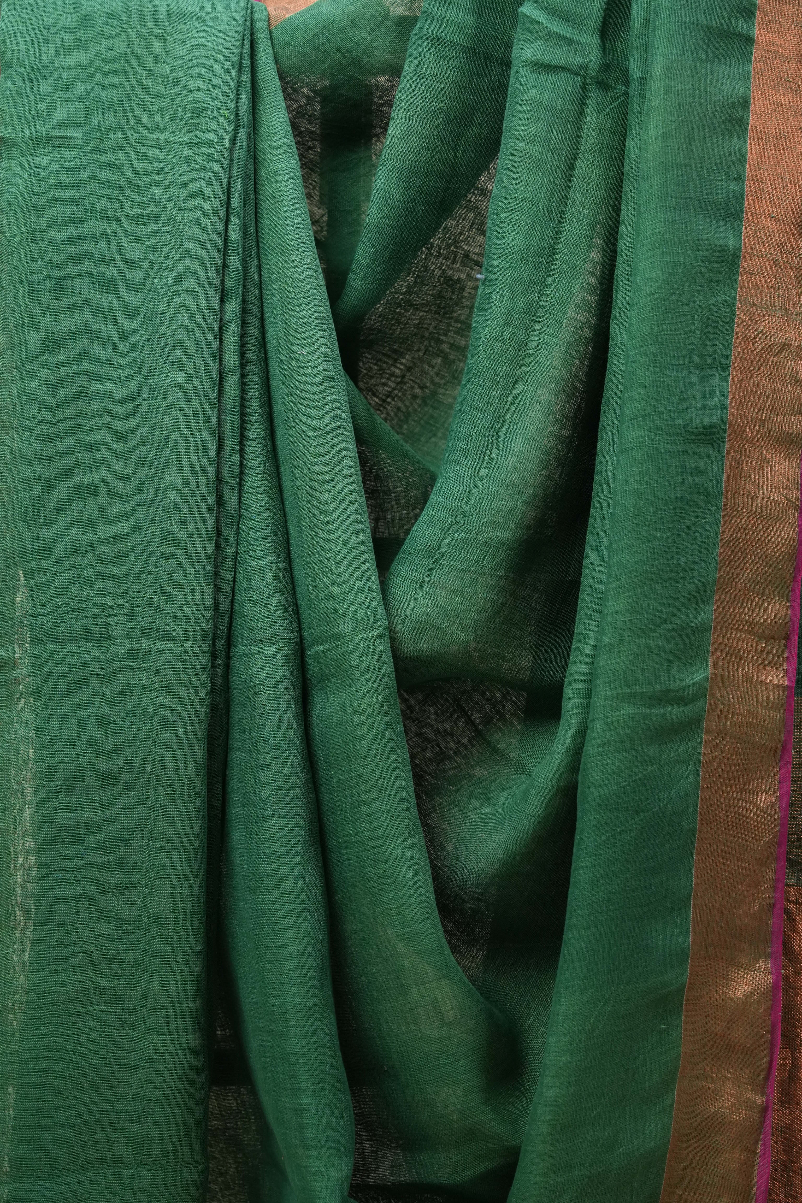 Green Plain Linen Saree With Pink Tassels - SRGPLS322