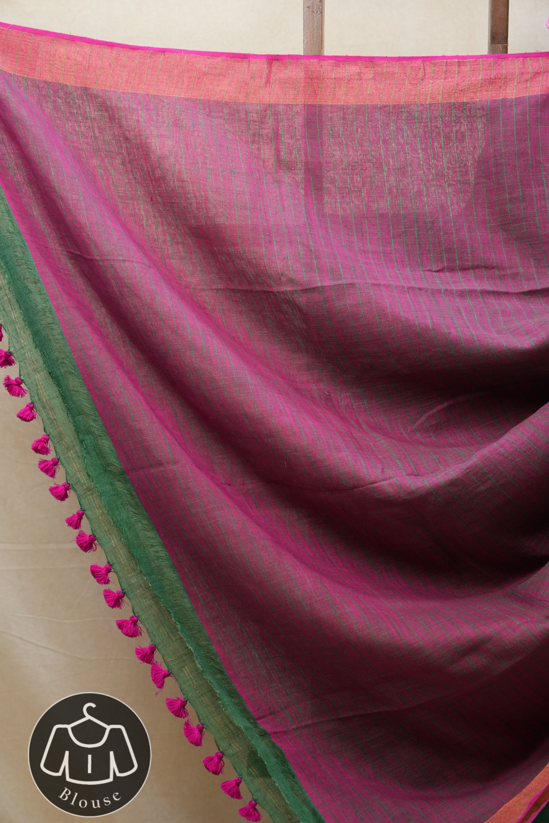 Green Plain Linen Saree With Pink Tassels - SRGPLS322