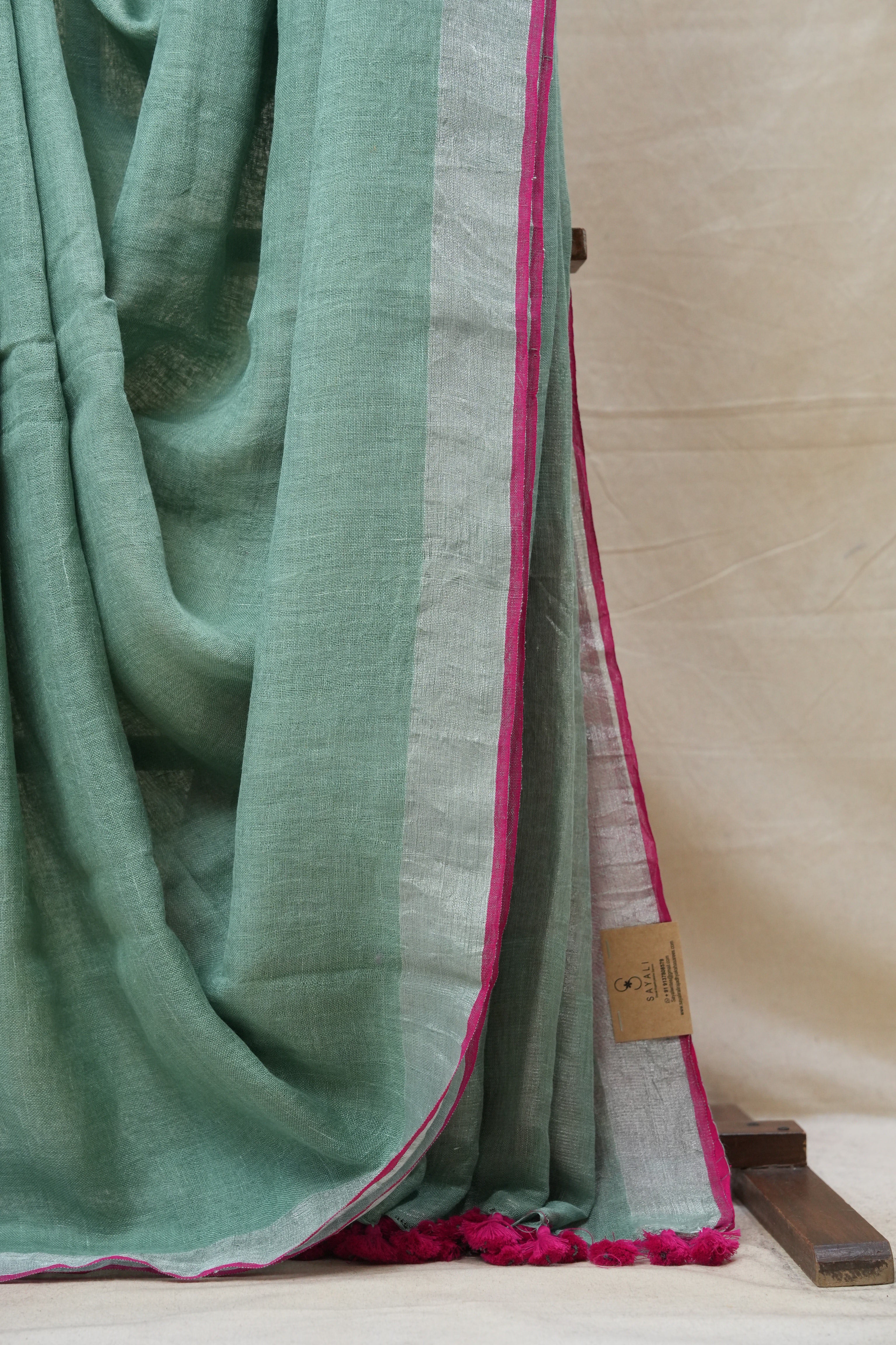 Mint Green Plain Linen Saree With Pink Tassels - SRMGPLS305