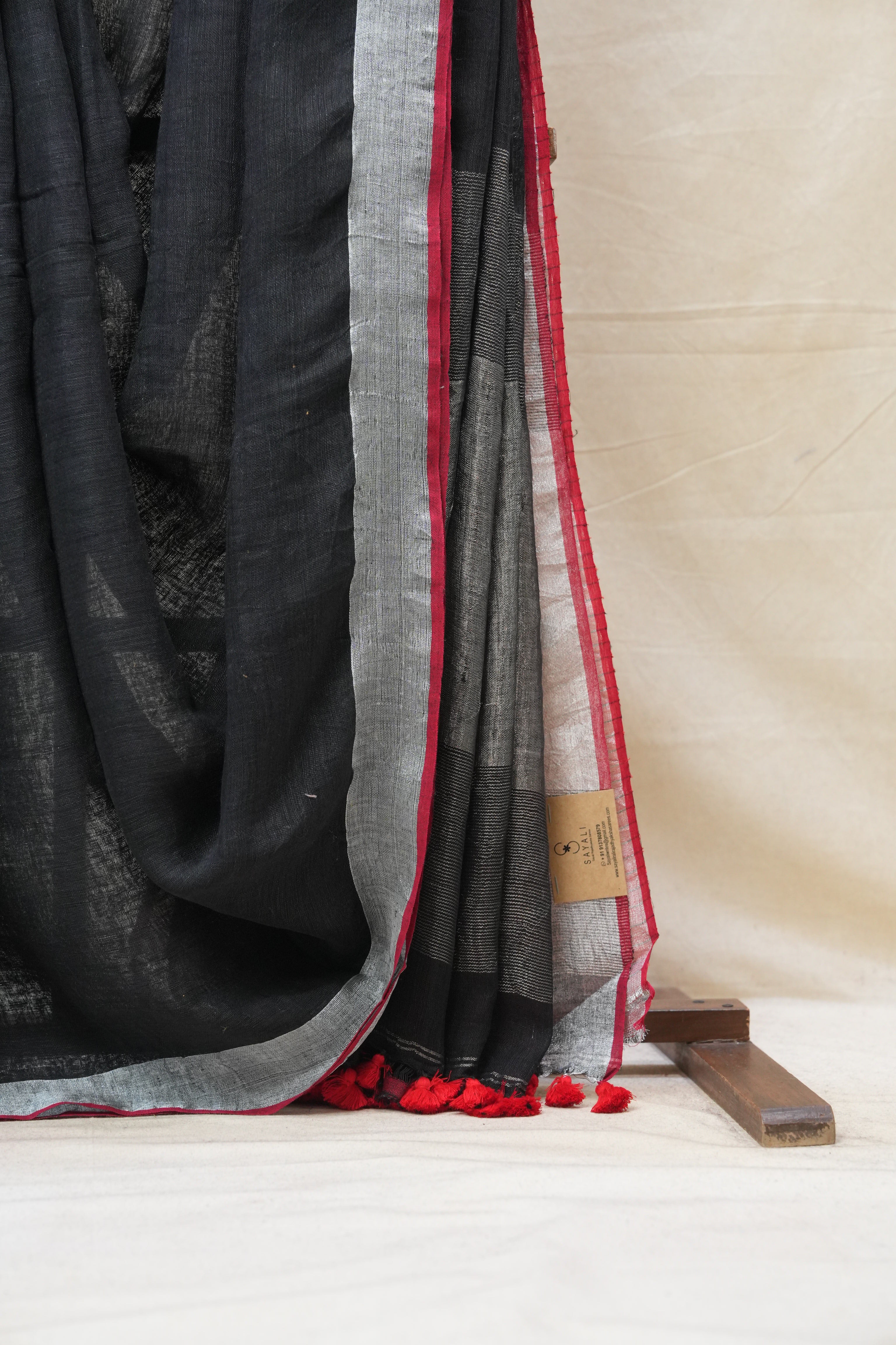 Black Plain Linen Saree With Red Tassels - SRBPLS304