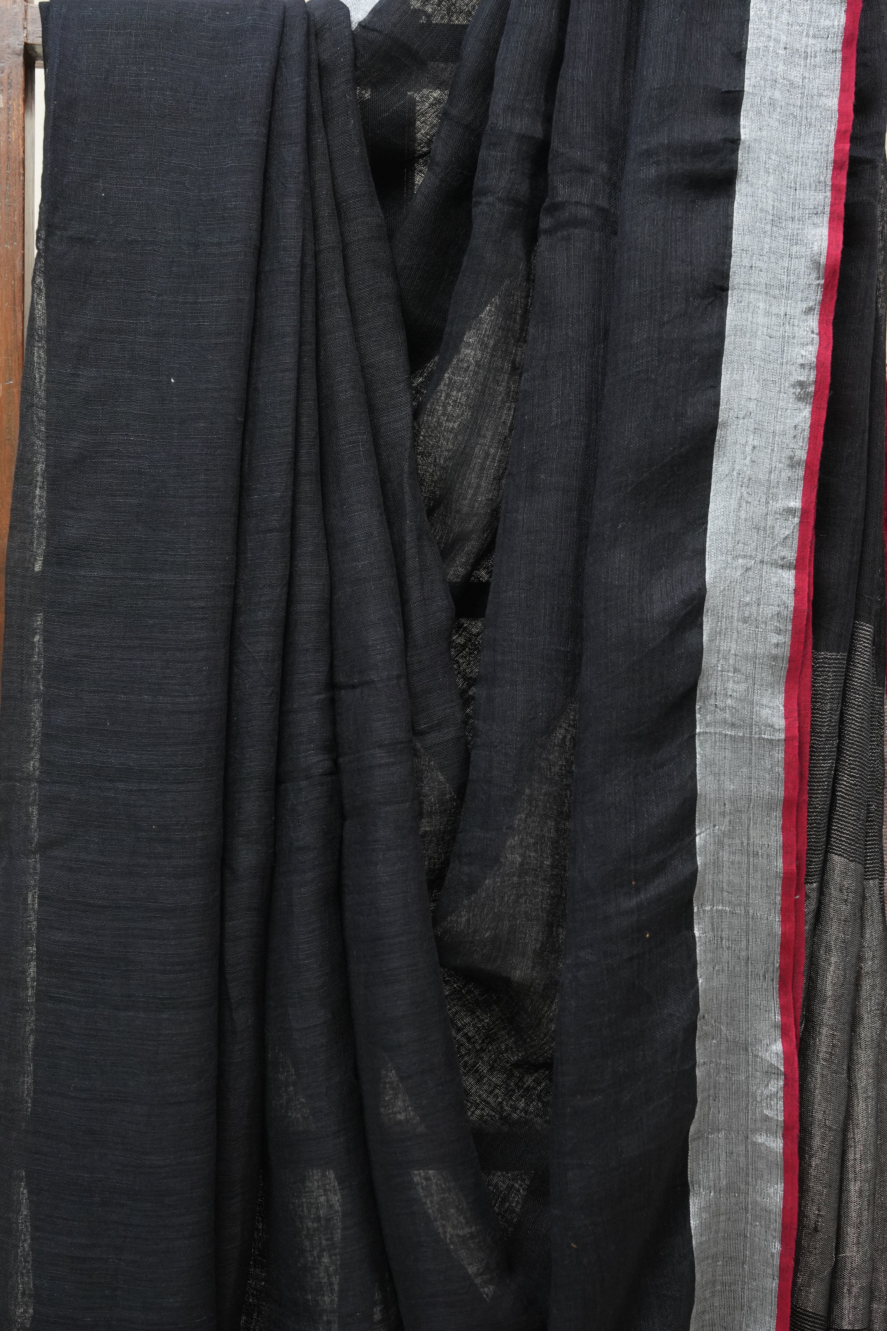 Black Plain Linen Saree With Red Tassels - SRBPLS304