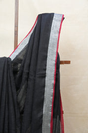 Black Plain Linen Saree With Red Tassels - SRBPLS304