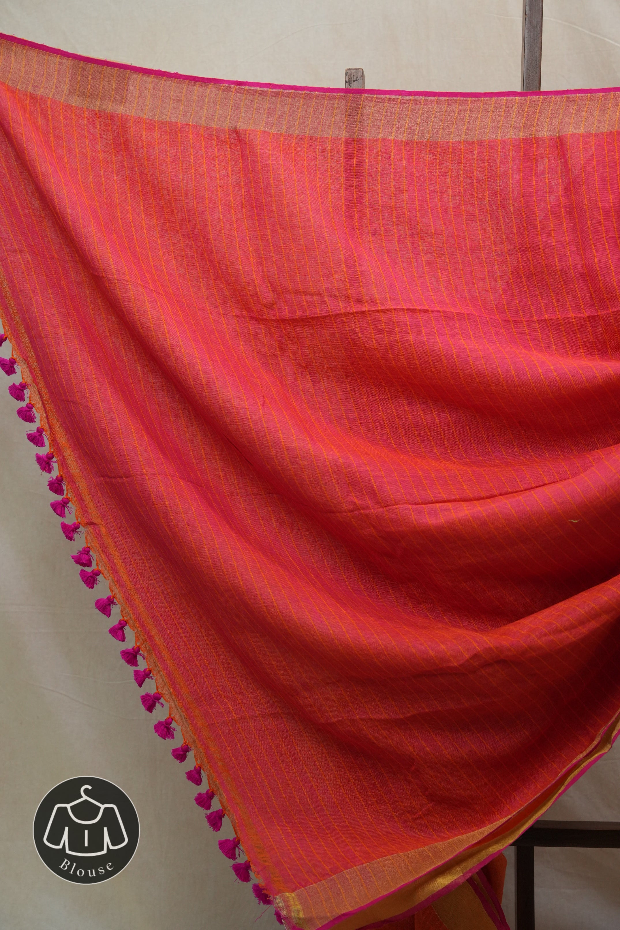 Orange Plain Linen Saree With Pink Tassels - SROPLS302