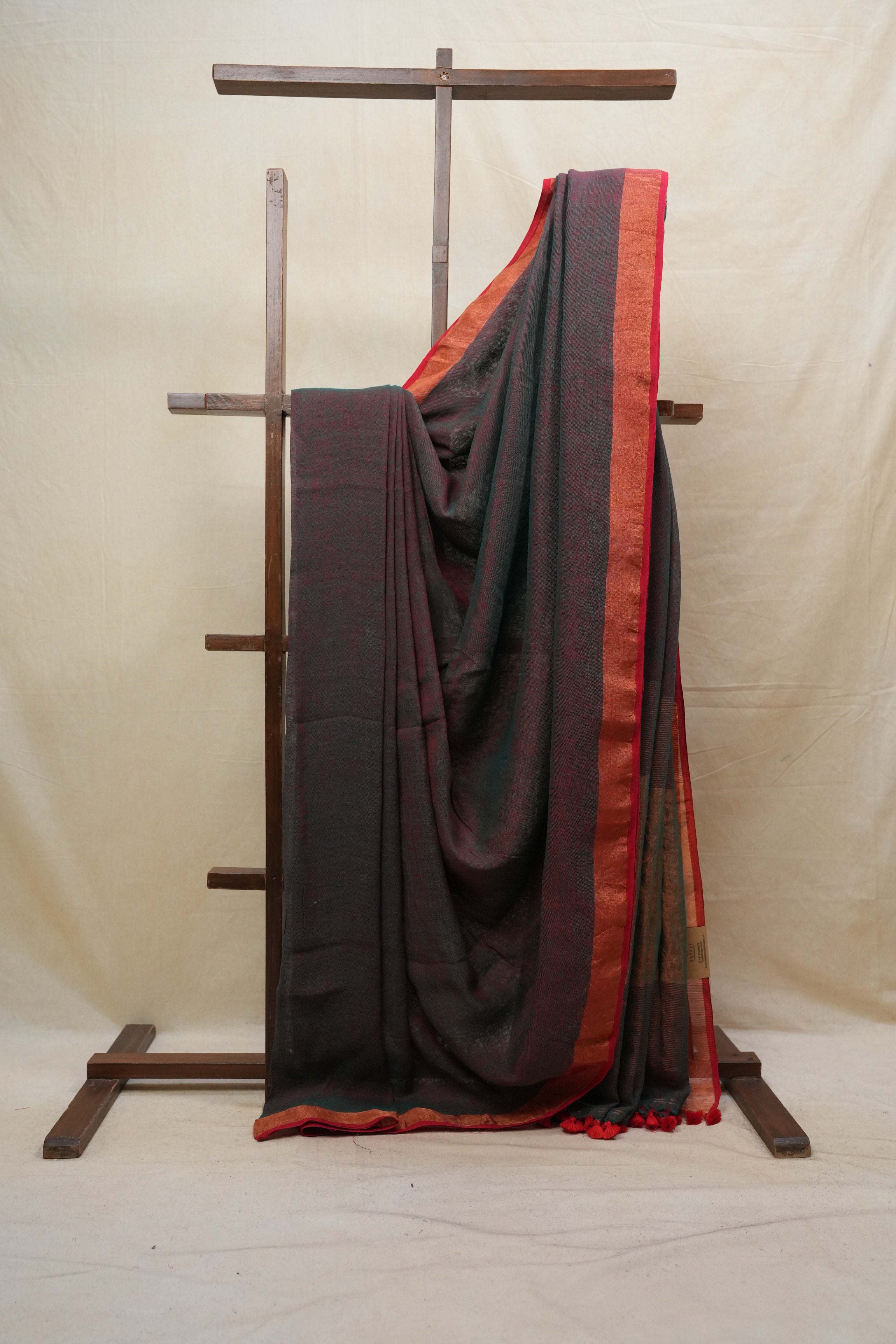 Green Plain Linen Saree With Pink Tassels - SRGPLS299