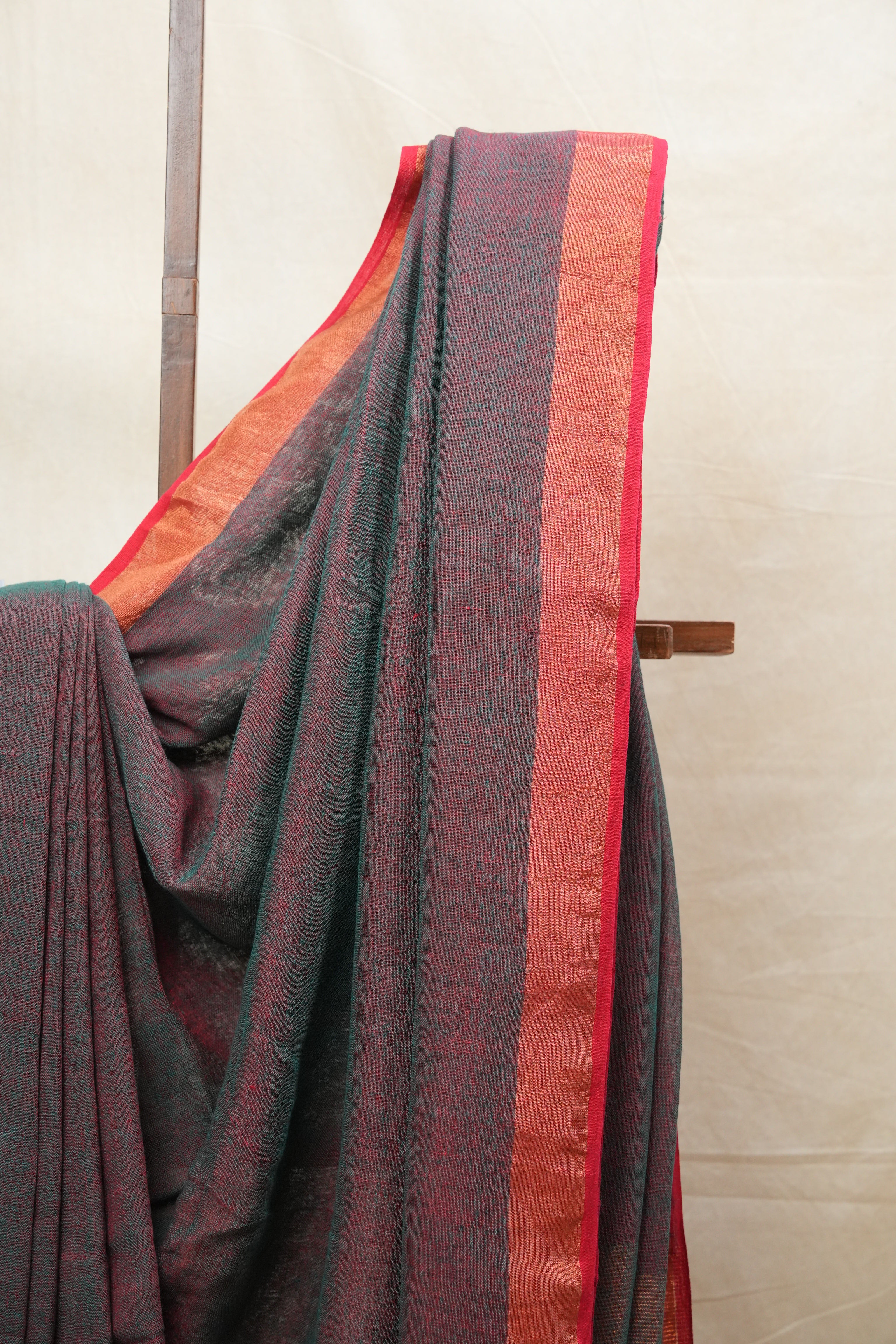 Green Plain Linen Saree With Pink Tassels - SRGPLS299