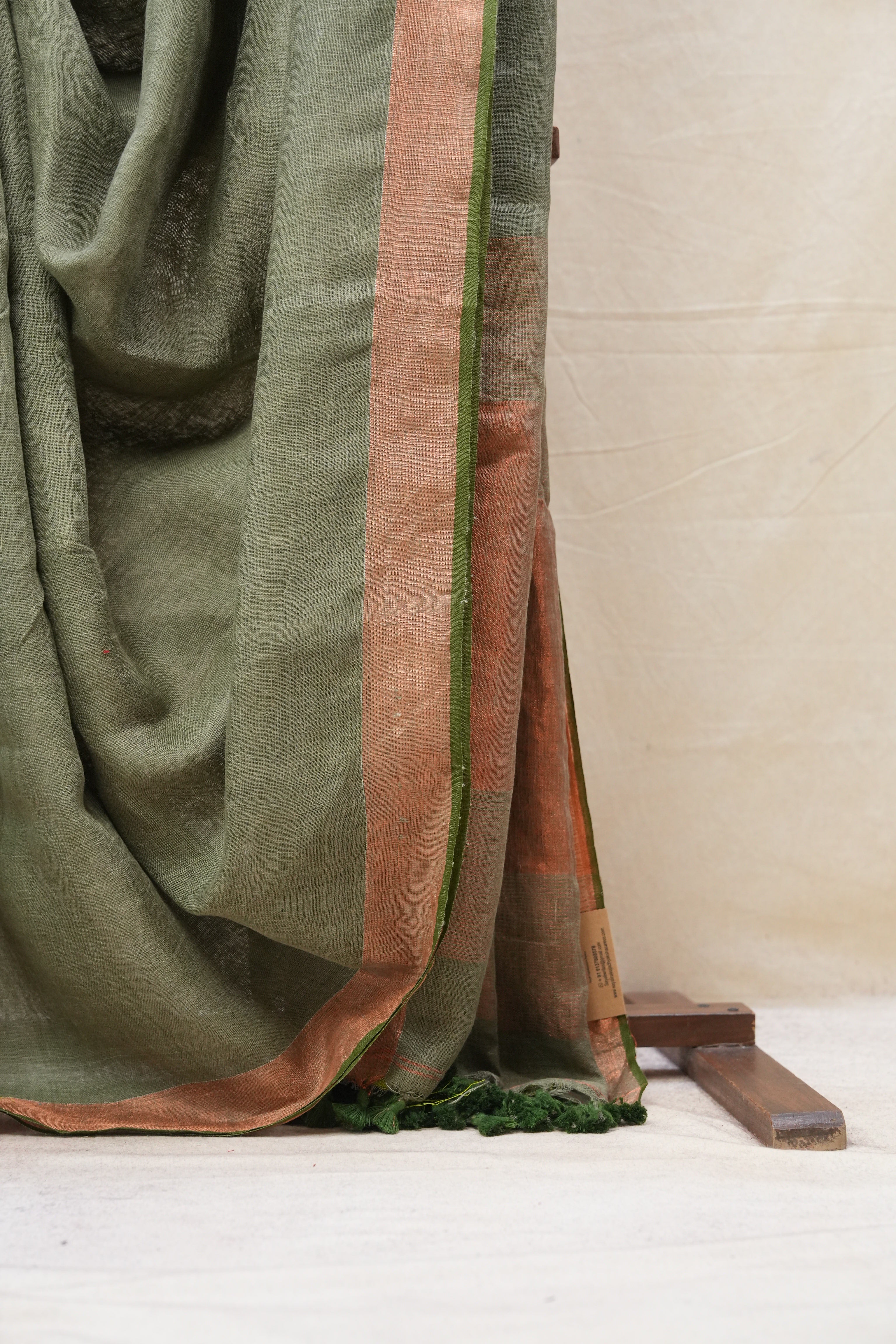 Olive Plain Linen Saree With Olive Tassels - SROPLS313