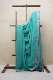 Sky Blue Plain Linen Saree With Magenta Tassels - SRSBPLS314