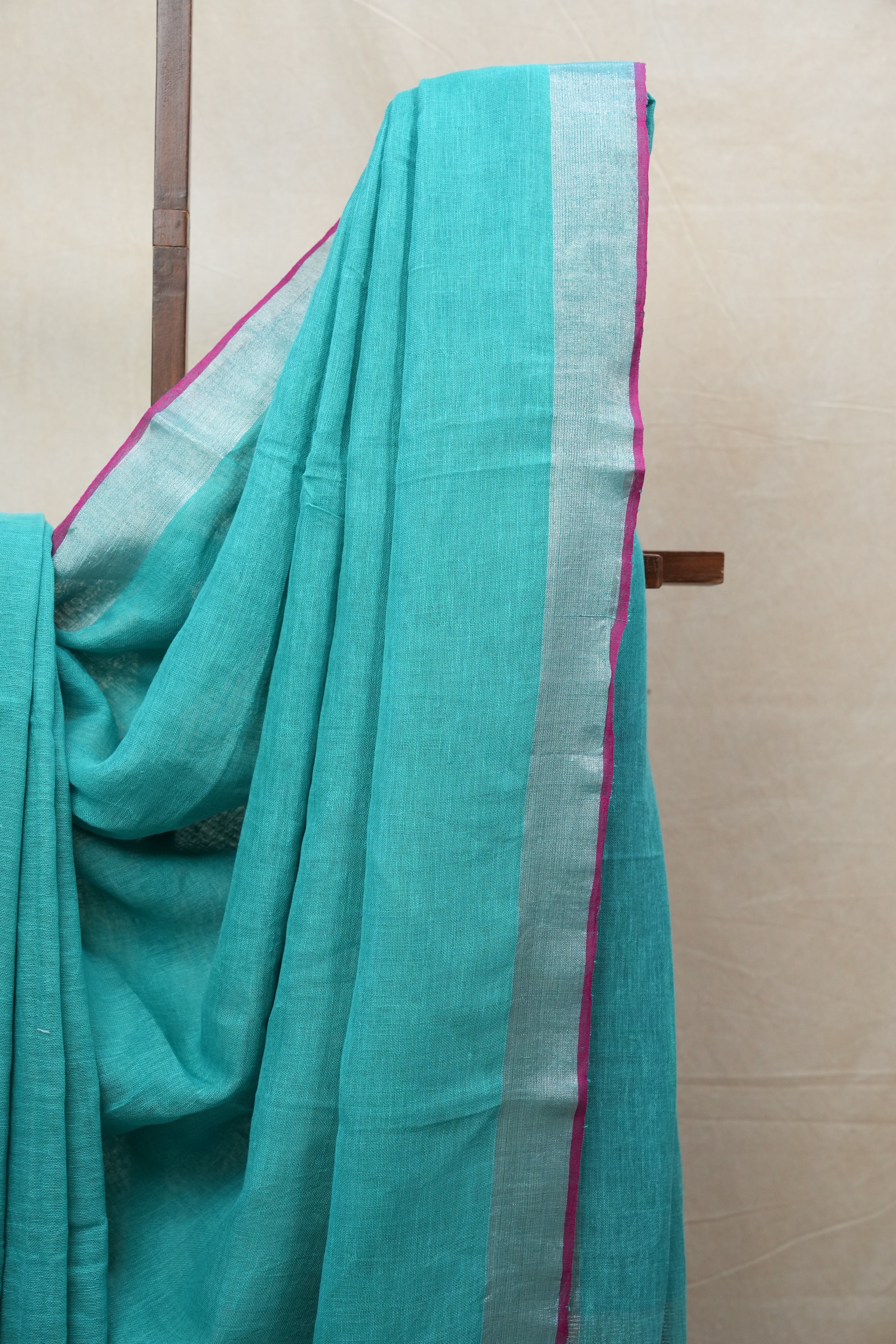 Sky Blue Plain Linen Saree With Magenta Tassels - SRSBPLS314