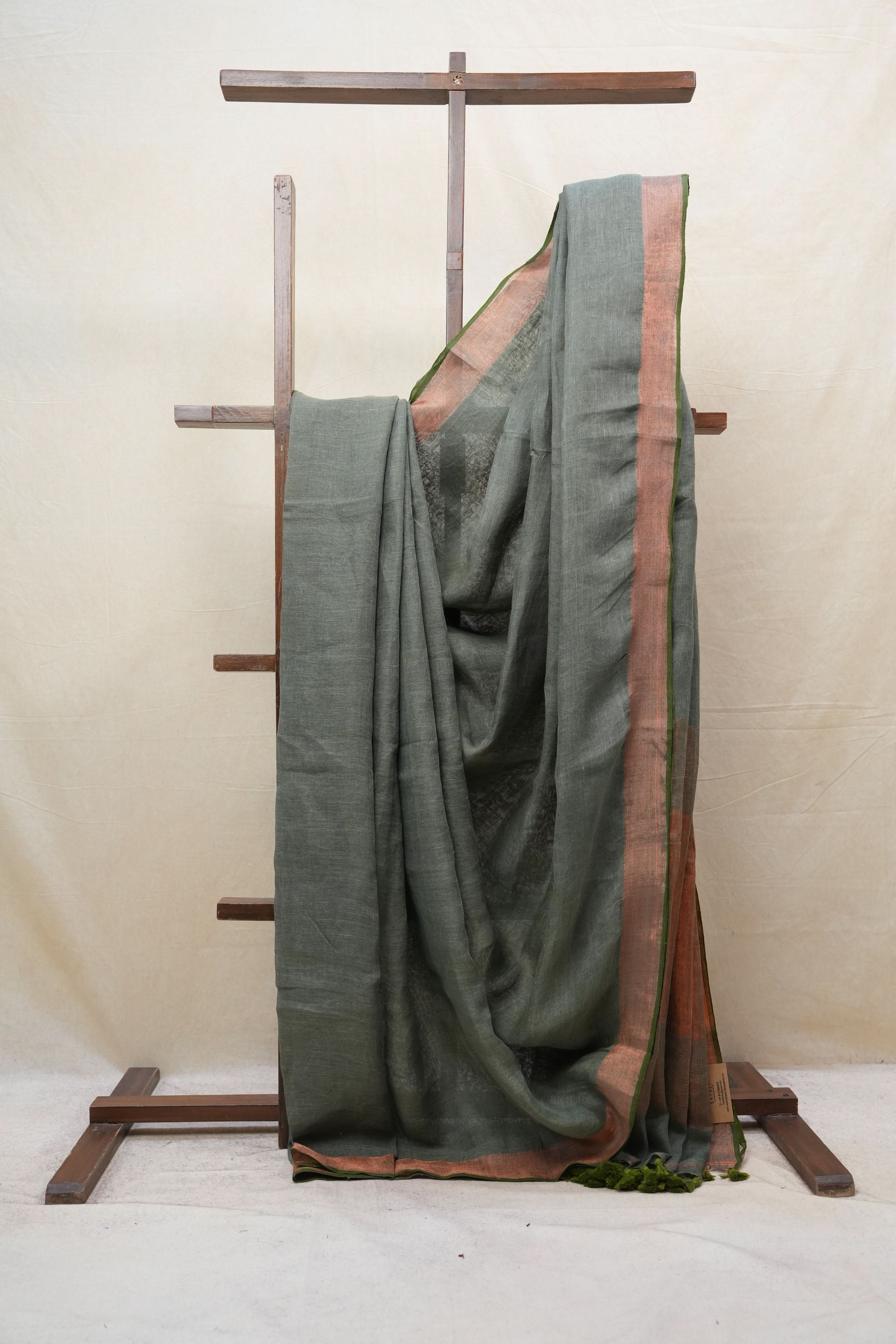 Green Plain Linen Saree With Olive Tassels - SRGPLS315