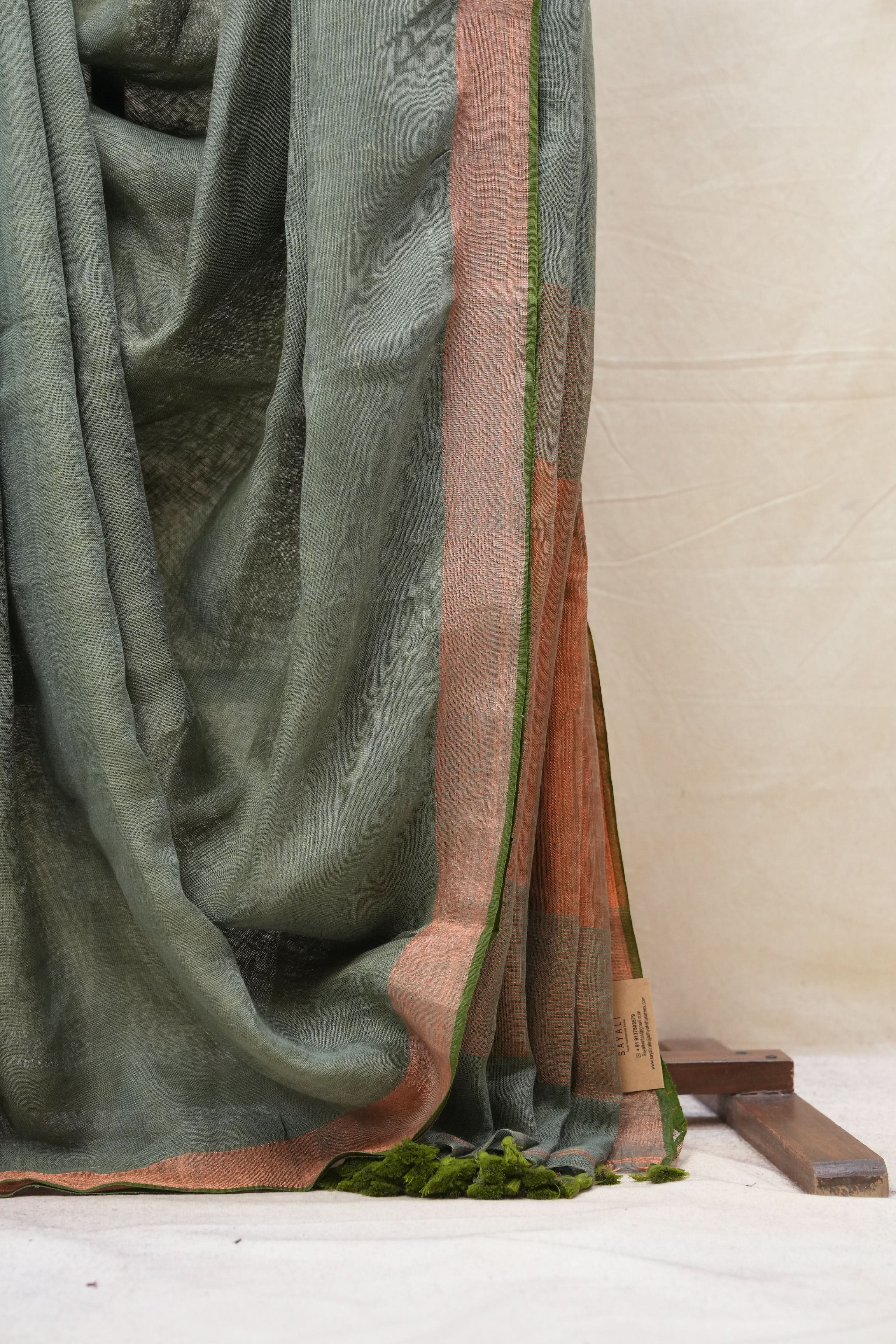 Green Plain Linen Saree With Olive Tassels - SRGPLS315