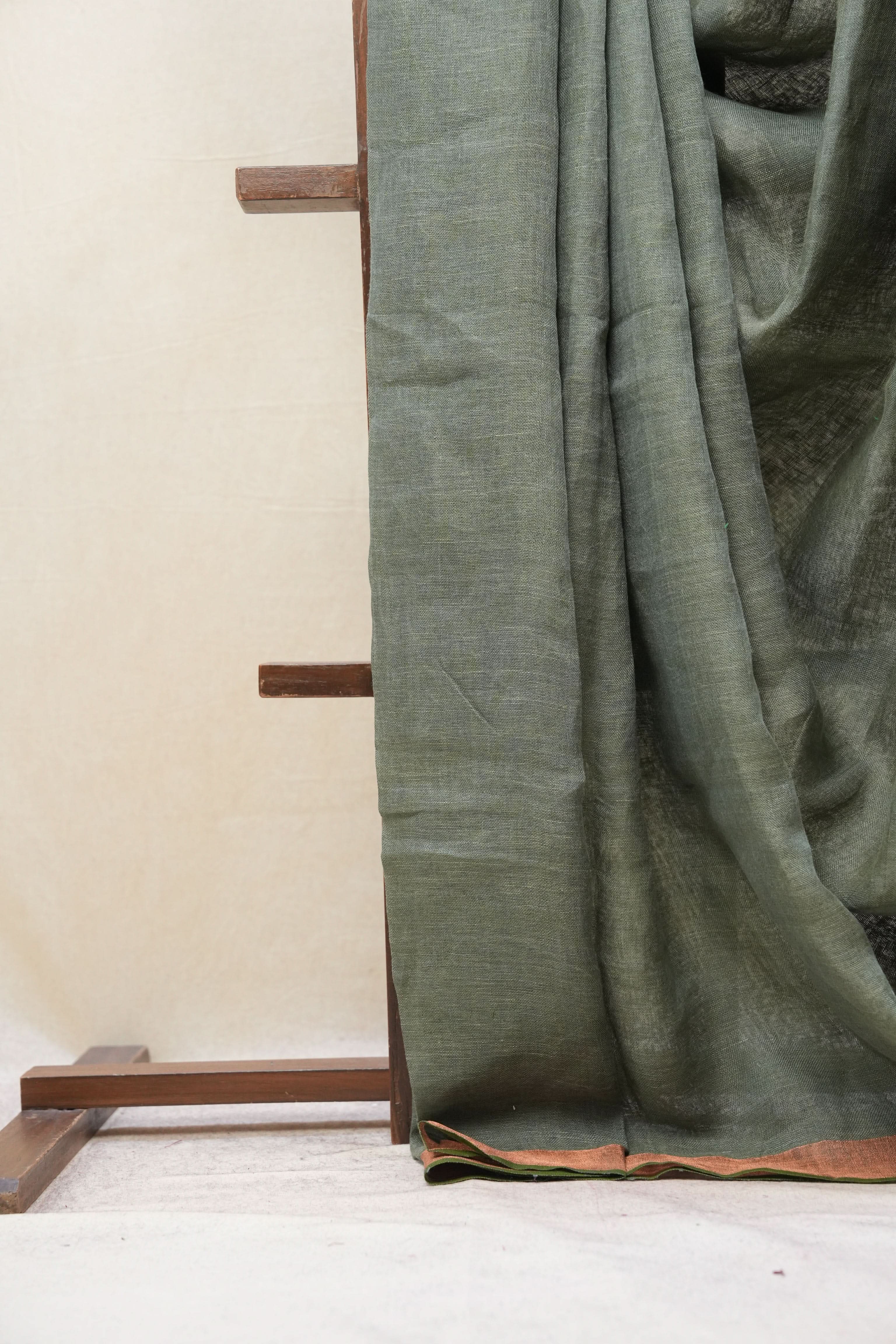Green Plain Linen Saree With Olive Tassels - SRGPLS315