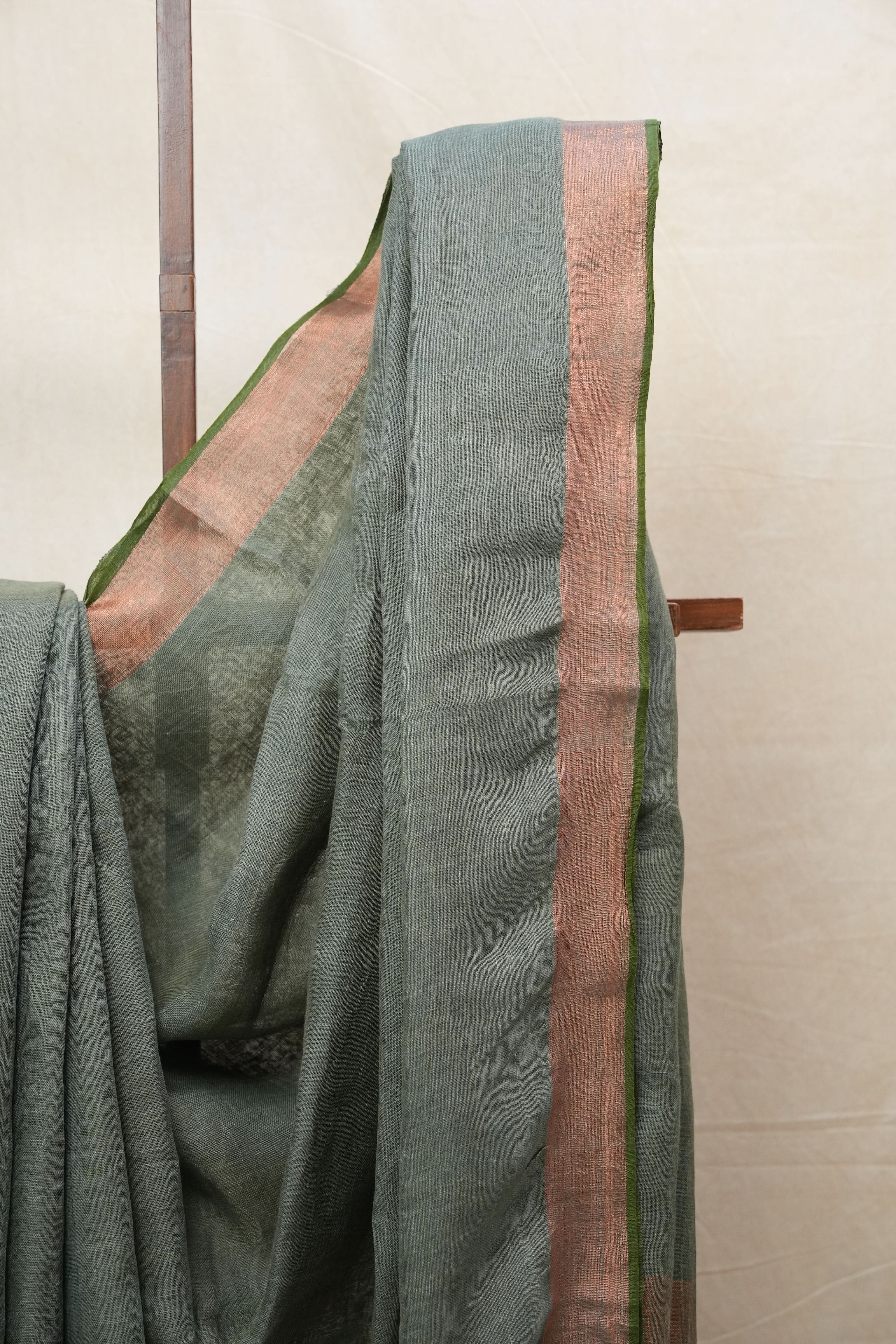 Green Plain Linen Saree With Olive Tassels - SRGPLS315