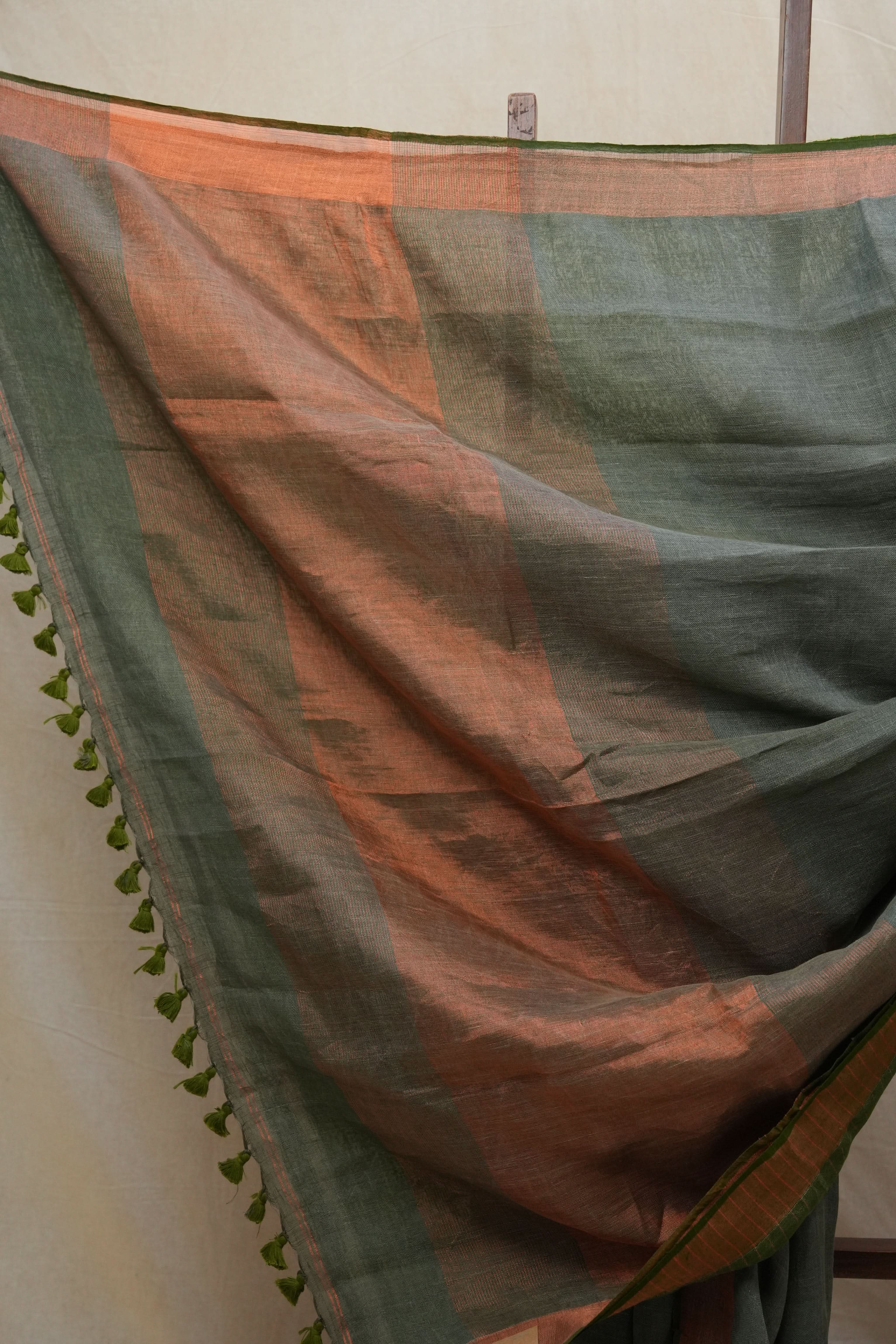 Green Plain Linen Saree With Olive Tassels - SRGPLS315