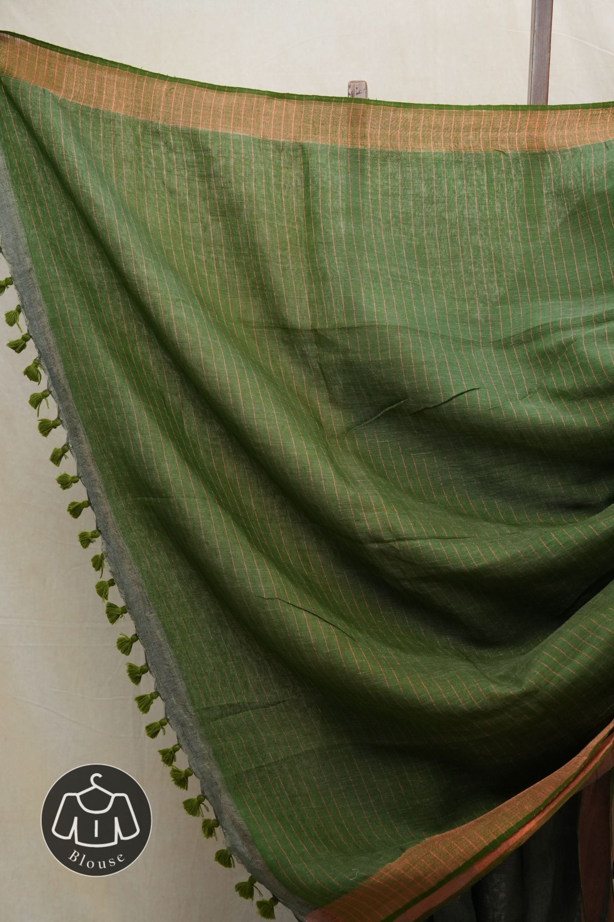 Green Plain Linen Saree With Olive Tassels - SRGPLS315