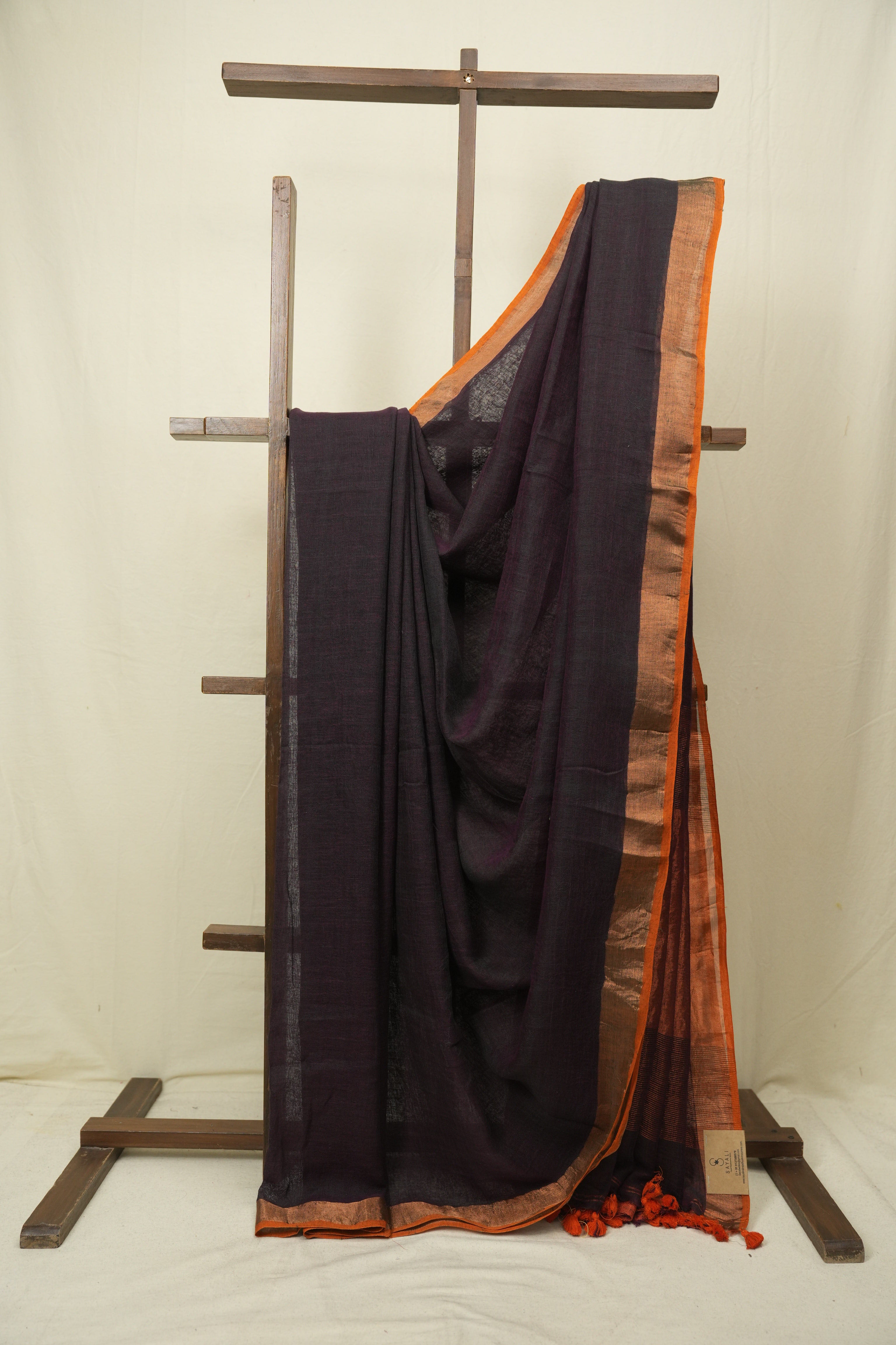 Wine Plain Linen Saree With Orange Tassels - SRWPLS525