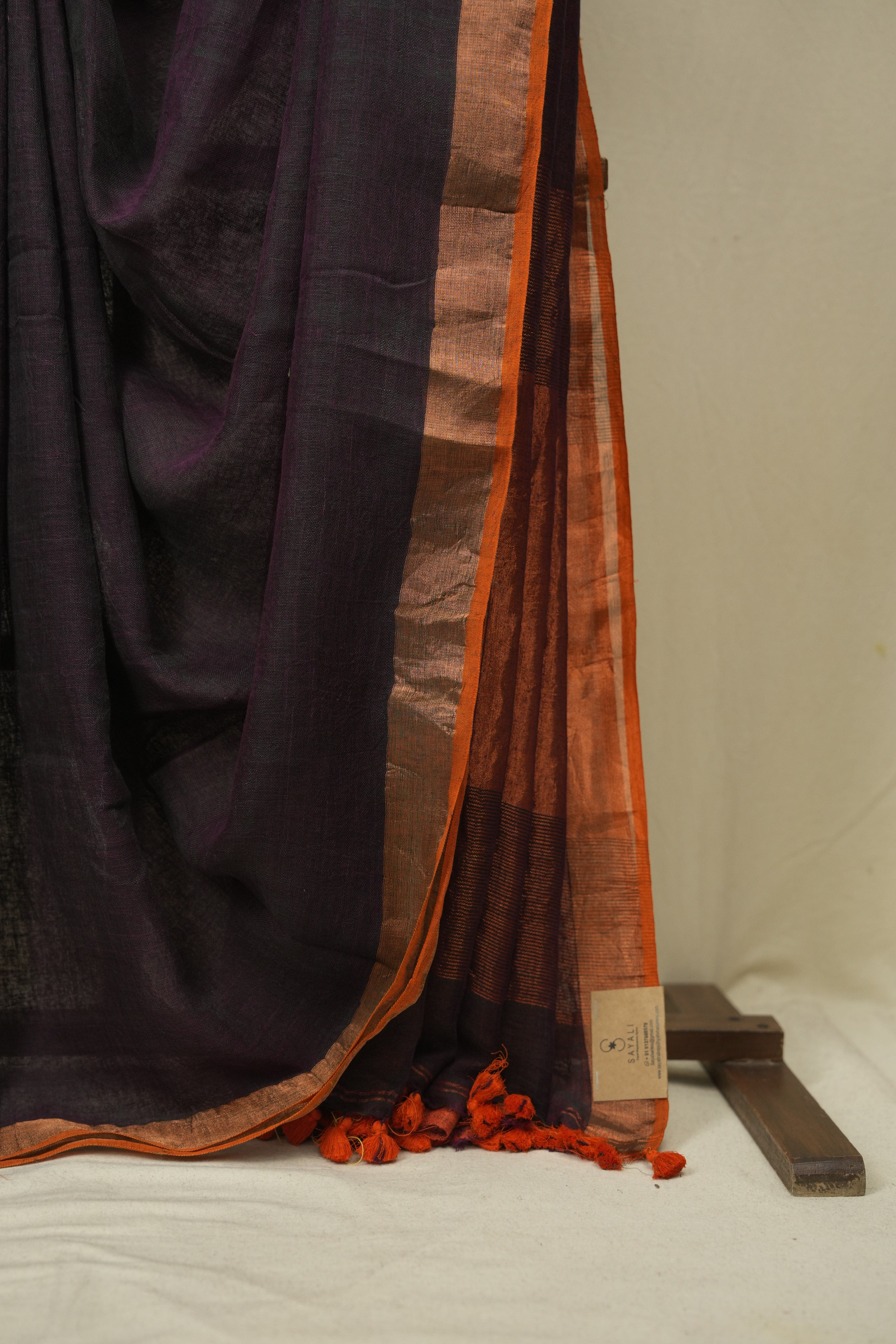 Wine Plain Linen Saree With Orange Tassels - SRWPLS525