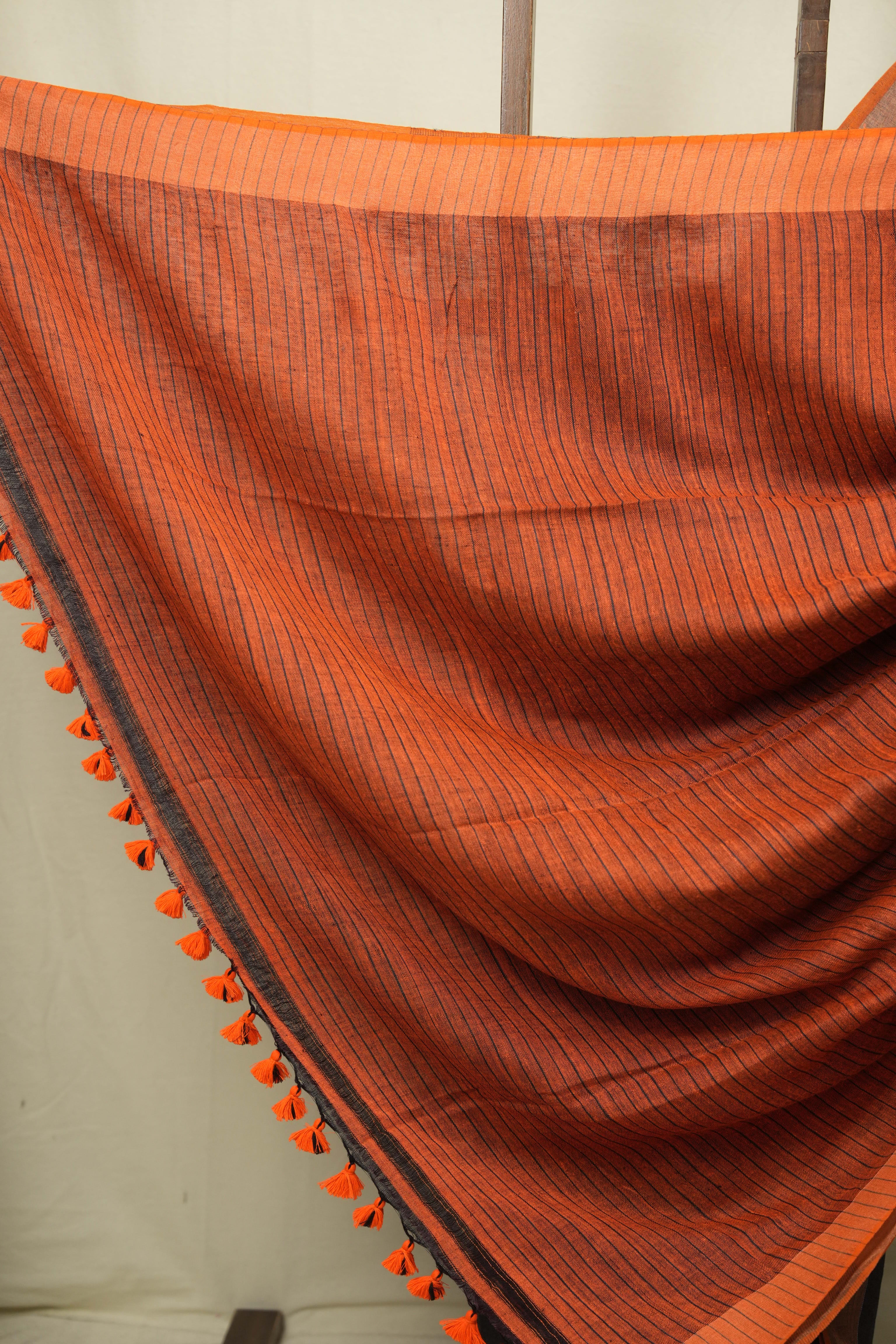 Grey Plain Linen Saree With Orange Tassels - SRGPLS524