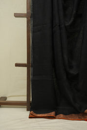 Black Plain Linen Saree With Orange Tassels - SRBPLS523