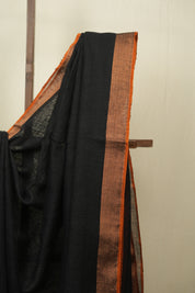 Black Plain Linen Saree With Orange Tassels - SRBPLS523