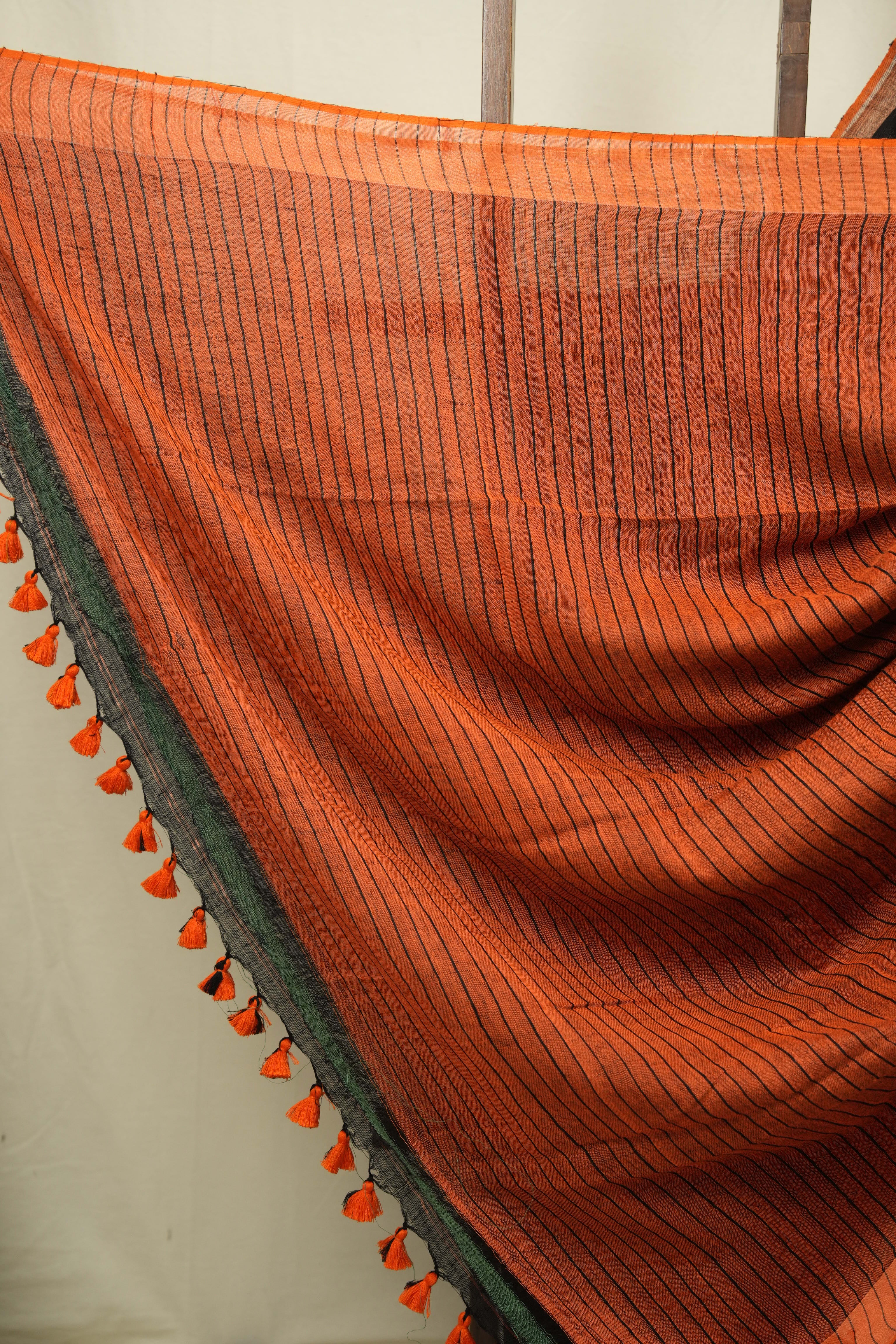 Black Plain Linen Saree With Orange Tassels - SRBPLS523