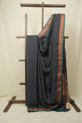 Charcoal Grey Plain Linen Saree With Green Tassels - SRCGPLS519