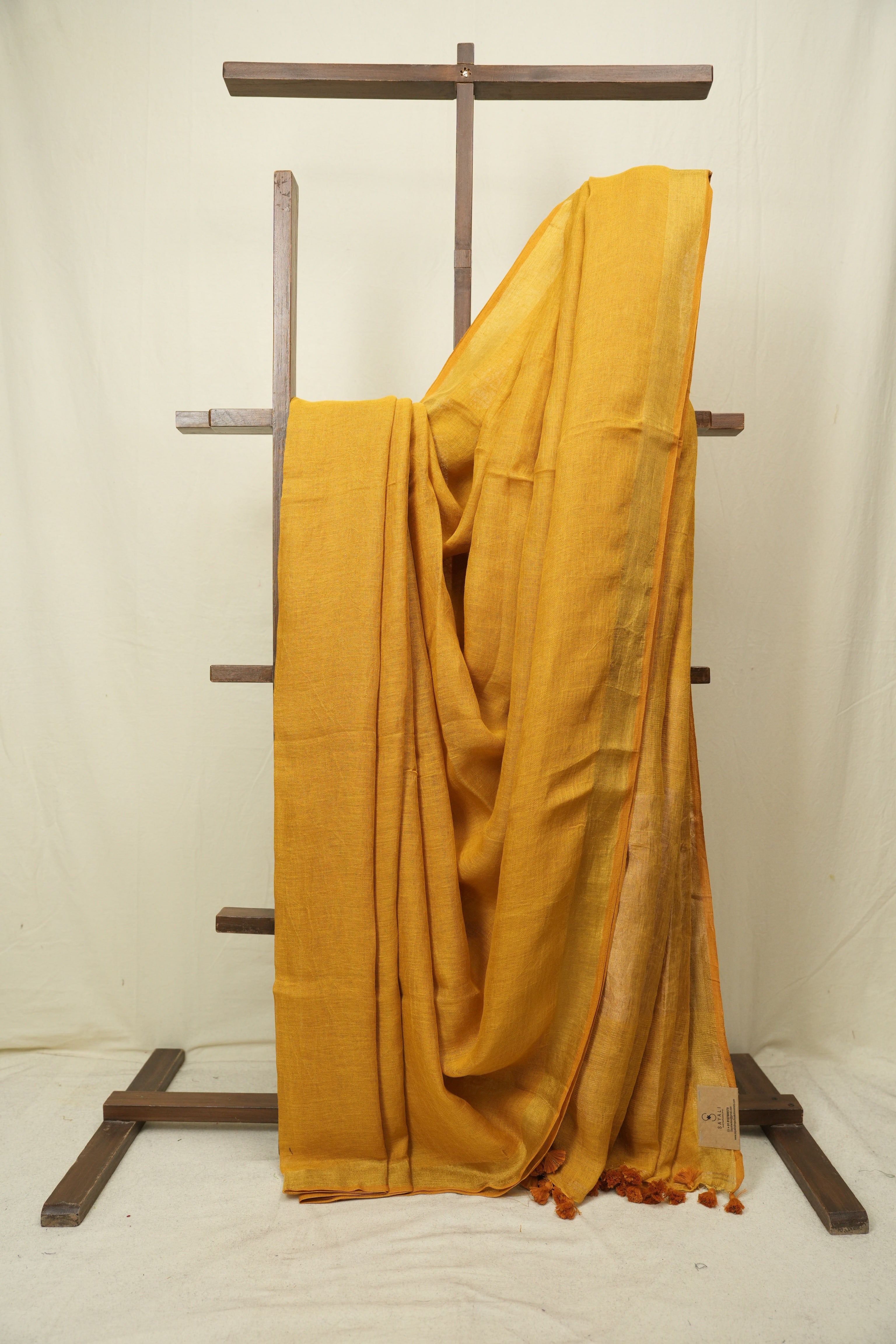 Mustard Yellow Plain Linen Saree With Gold Tassels - SRMYPLS516
