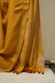 Mustard Yellow Plain Linen Saree With Gold Tassels - SRMYPLS516
