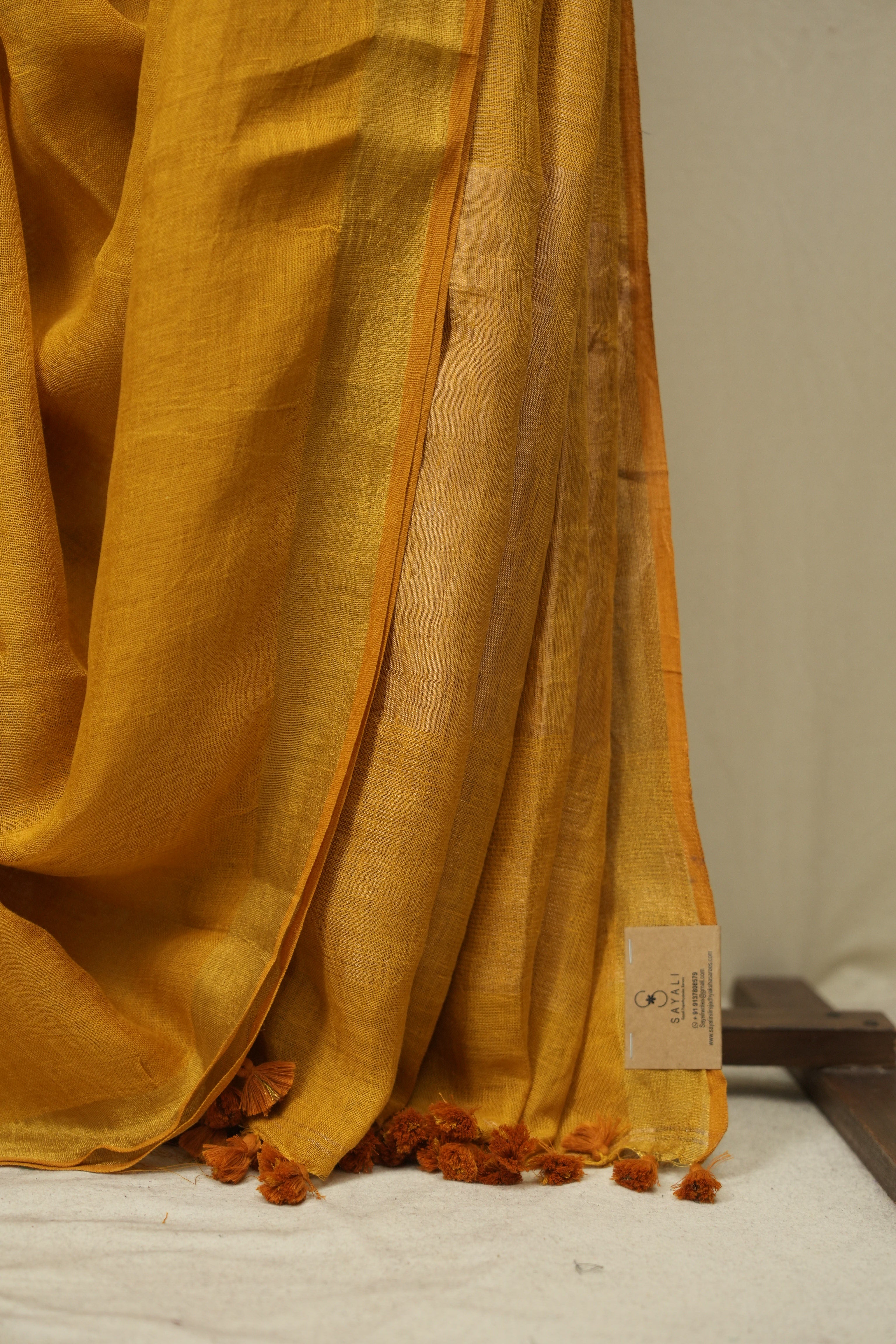 Mustard Yellow Plain Linen Saree With Gold Tassels - SRMYPLS516