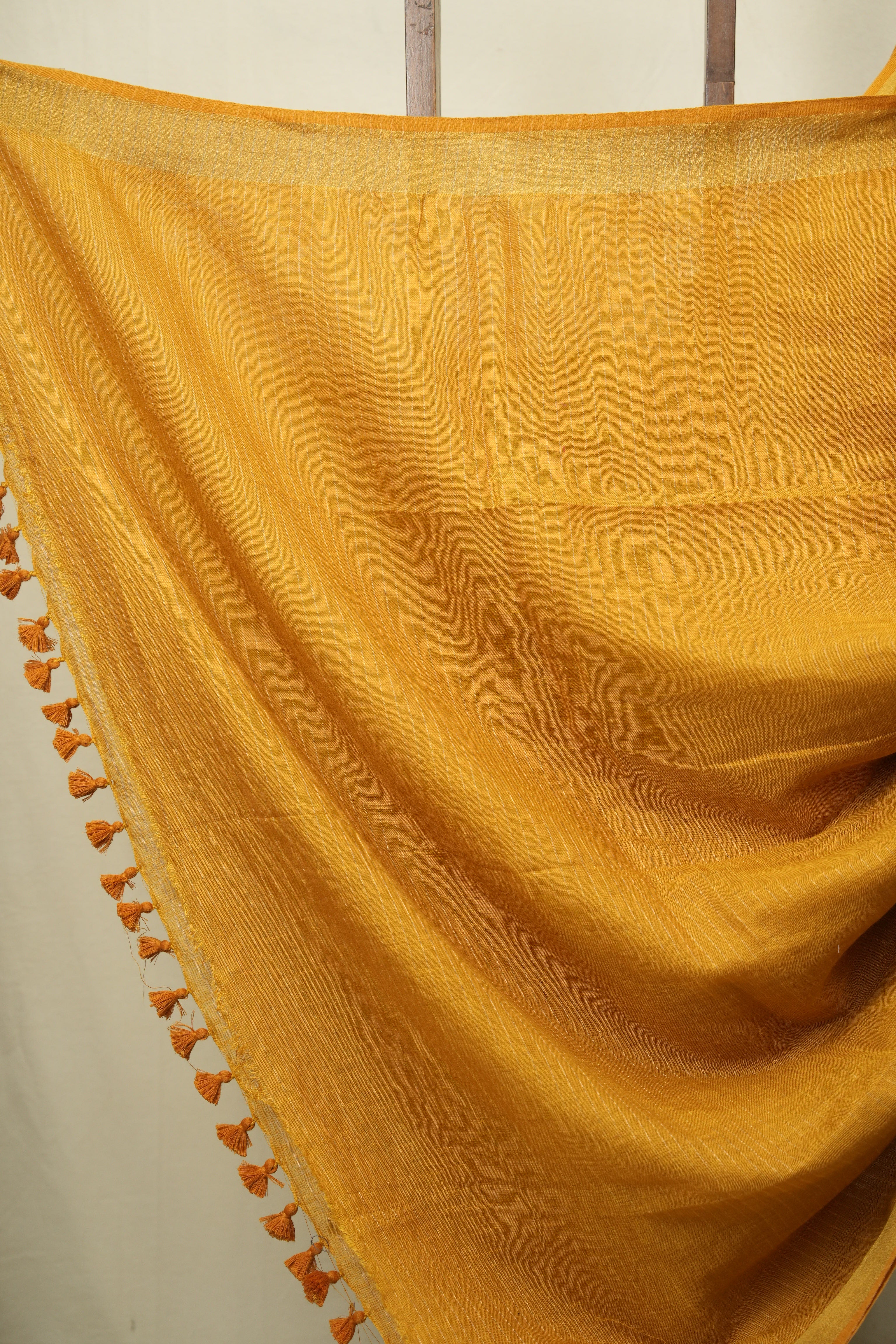 Mustard Yellow Plain Linen Saree With Gold Tassels - SRMYPLS516