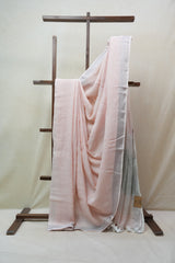Light Peach Plain Linen Saree With White Tassels - SRLPPLS295