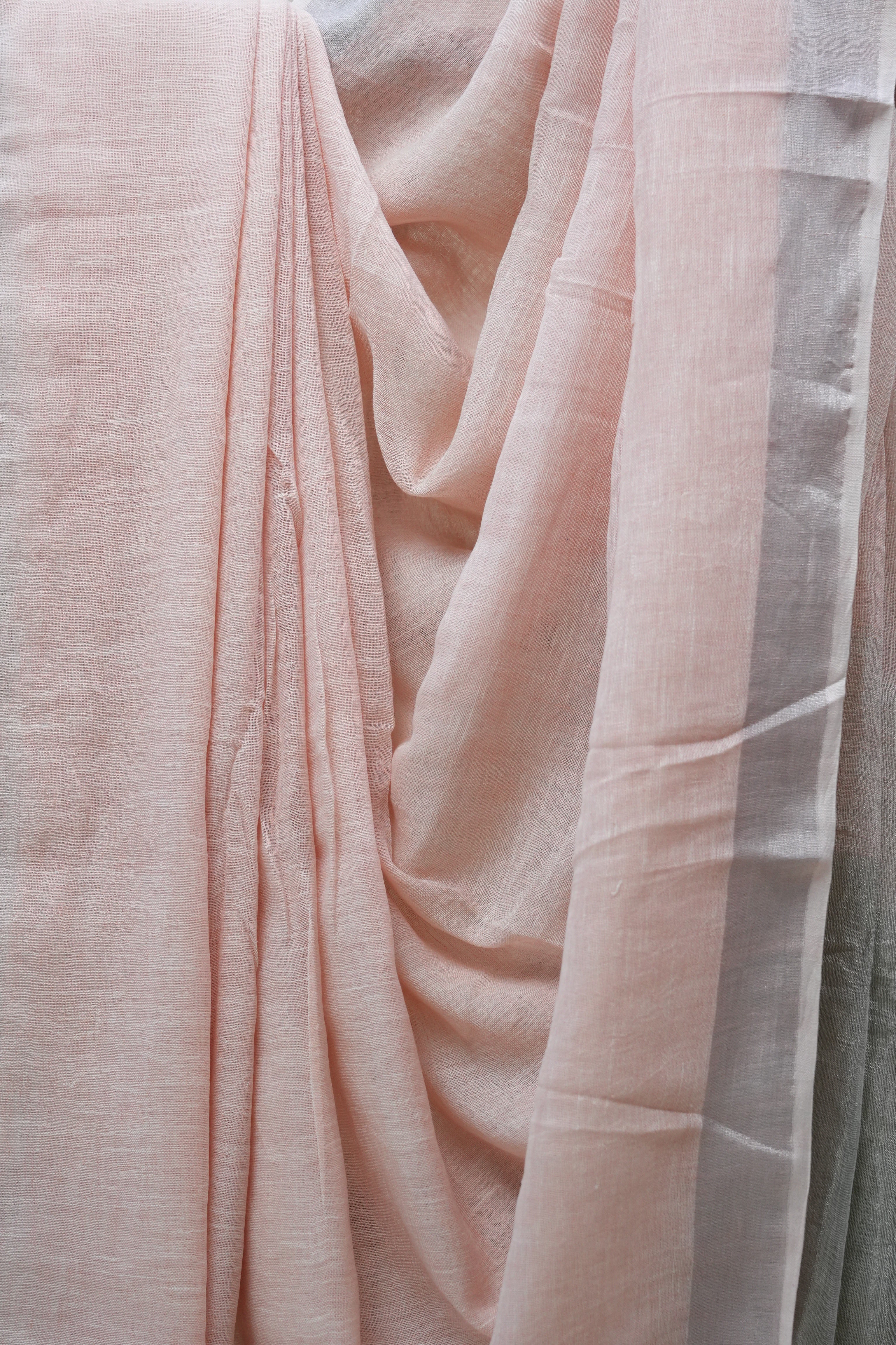 Light Peach Plain Linen Saree With White Tassels - SRLPPLS295