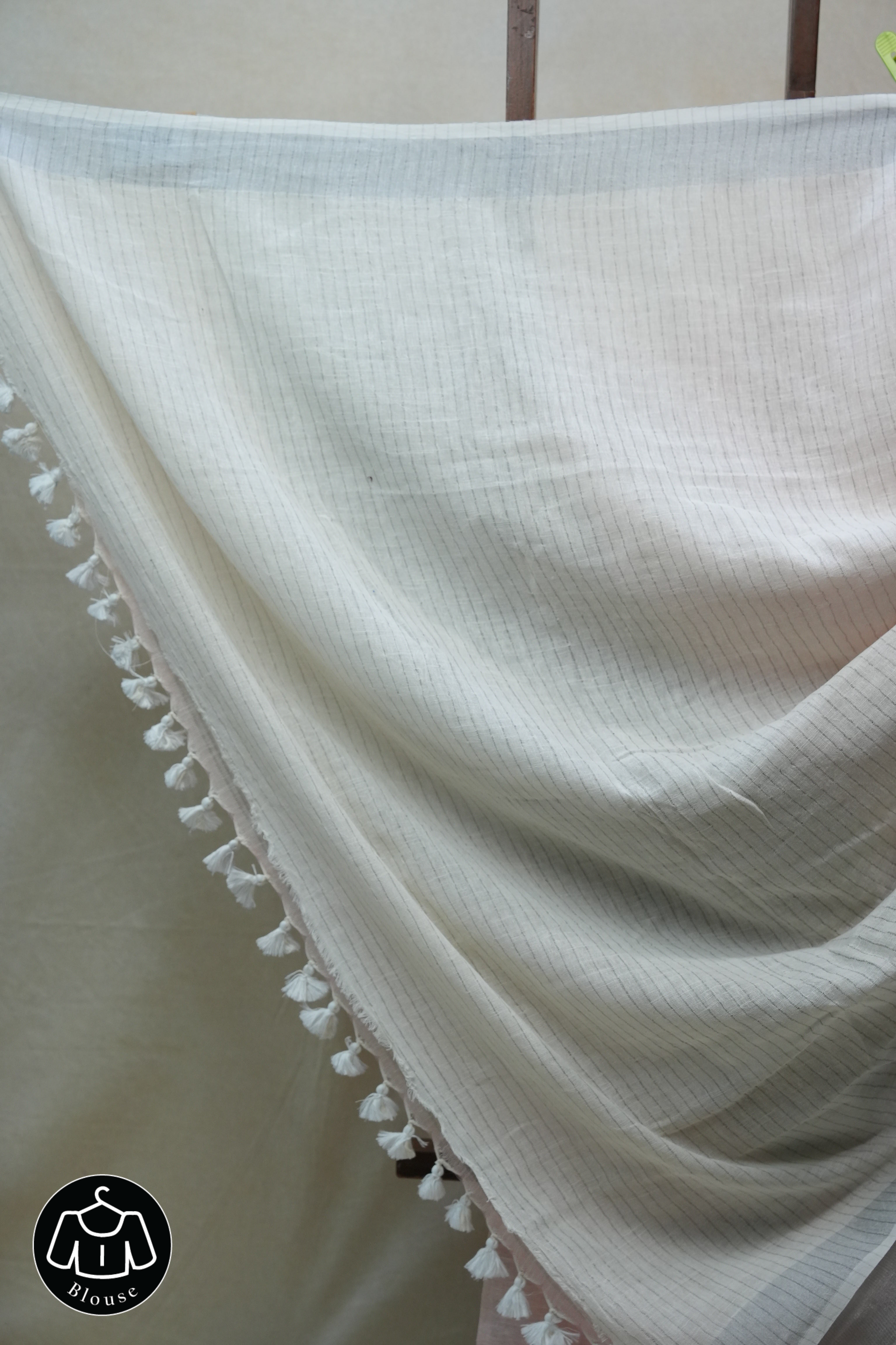 Light Peach Plain Linen Saree With White Tassels - SRLPPLS295