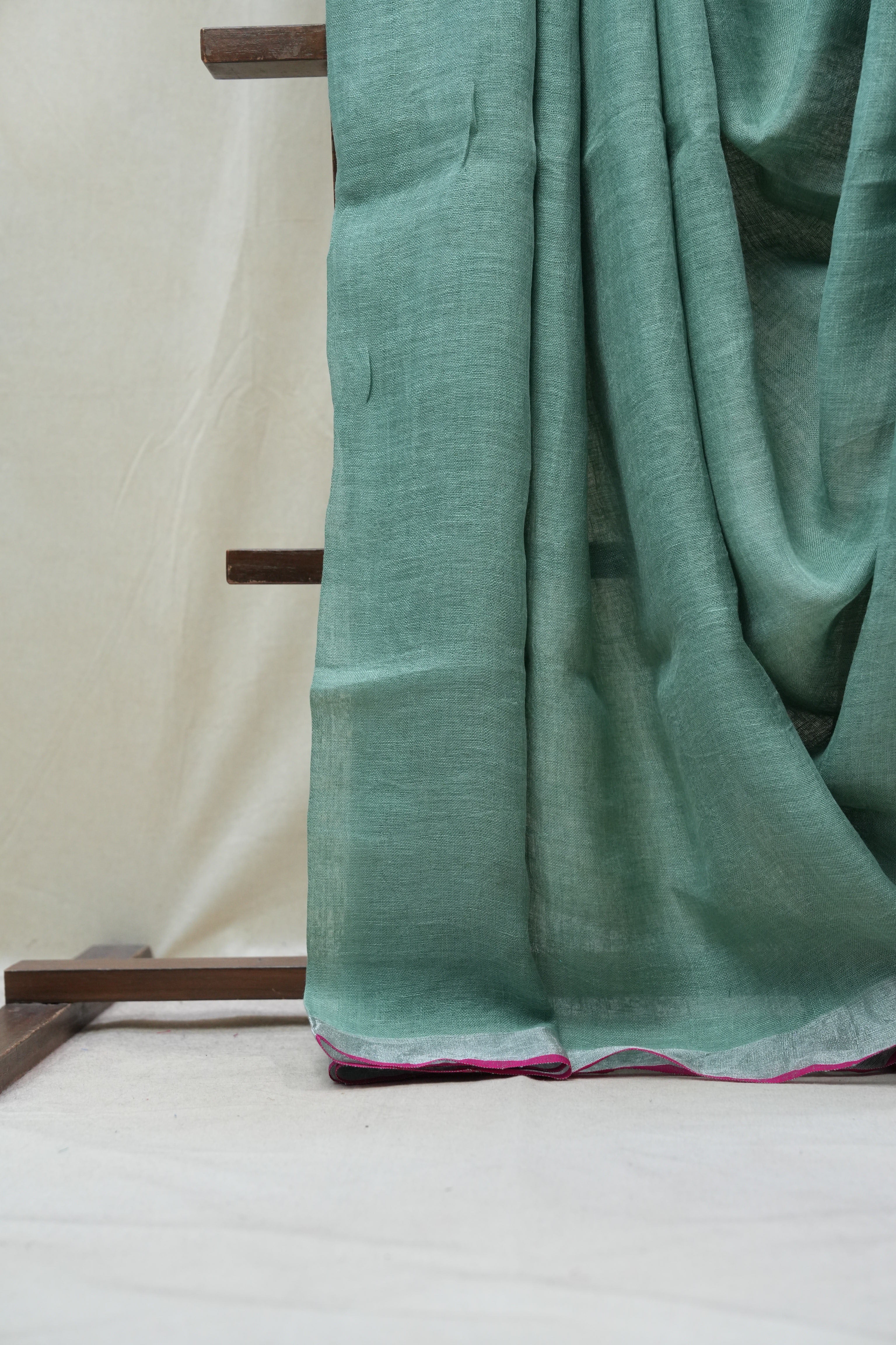 Light Green Plain Linen Saree With Pink Tassels - SRLGPLS276