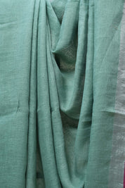 Light Green Plain Linen Saree With Pink Tassels - SRLGPLS276