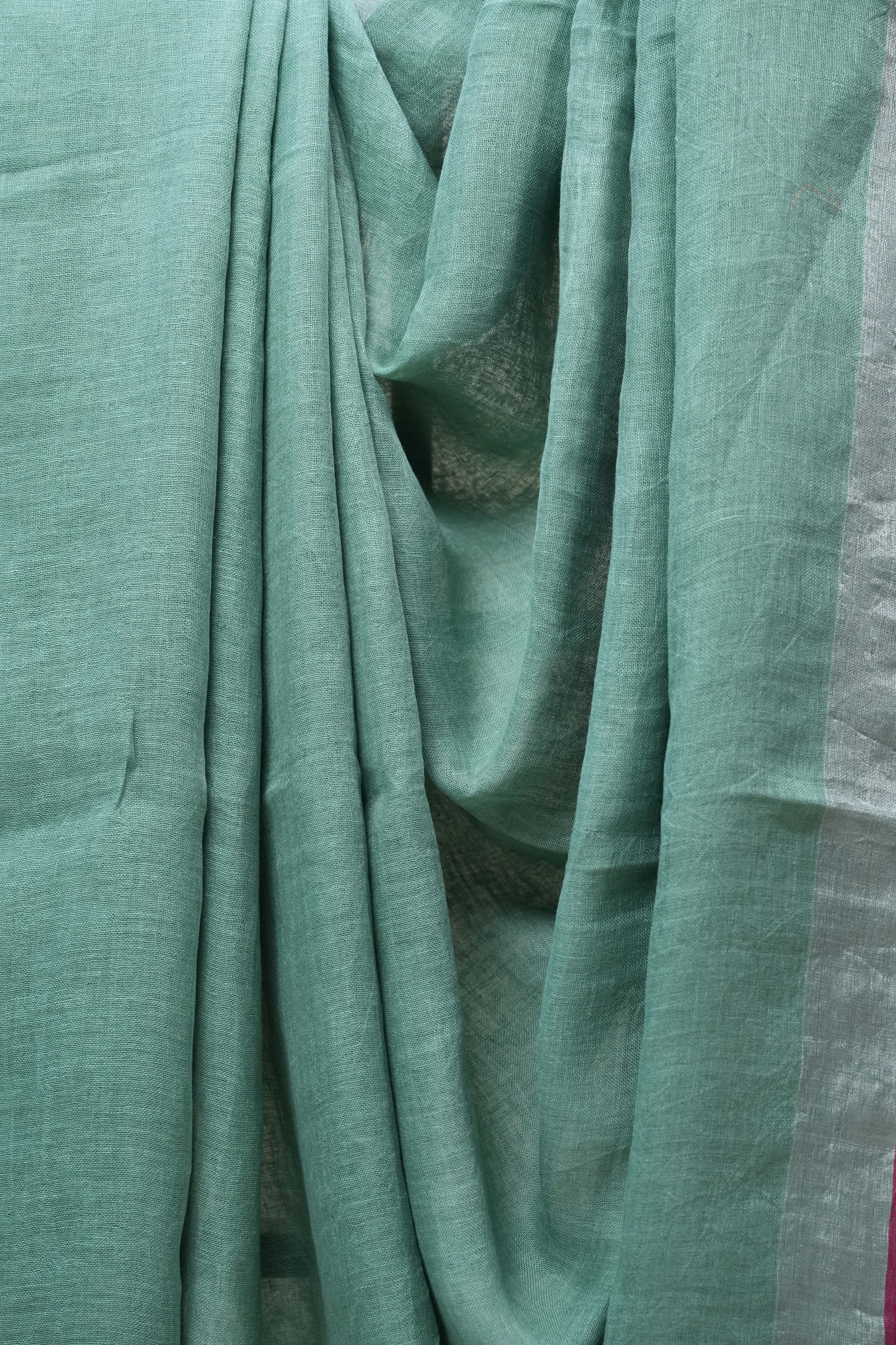Light Green Plain Linen Saree With Pink Tassels - SRLGPLS276