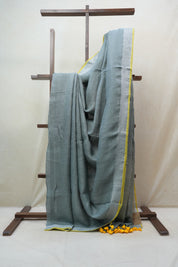 Olive Green Plain Linen Saree With Yellow Tassels - SROGPLS286