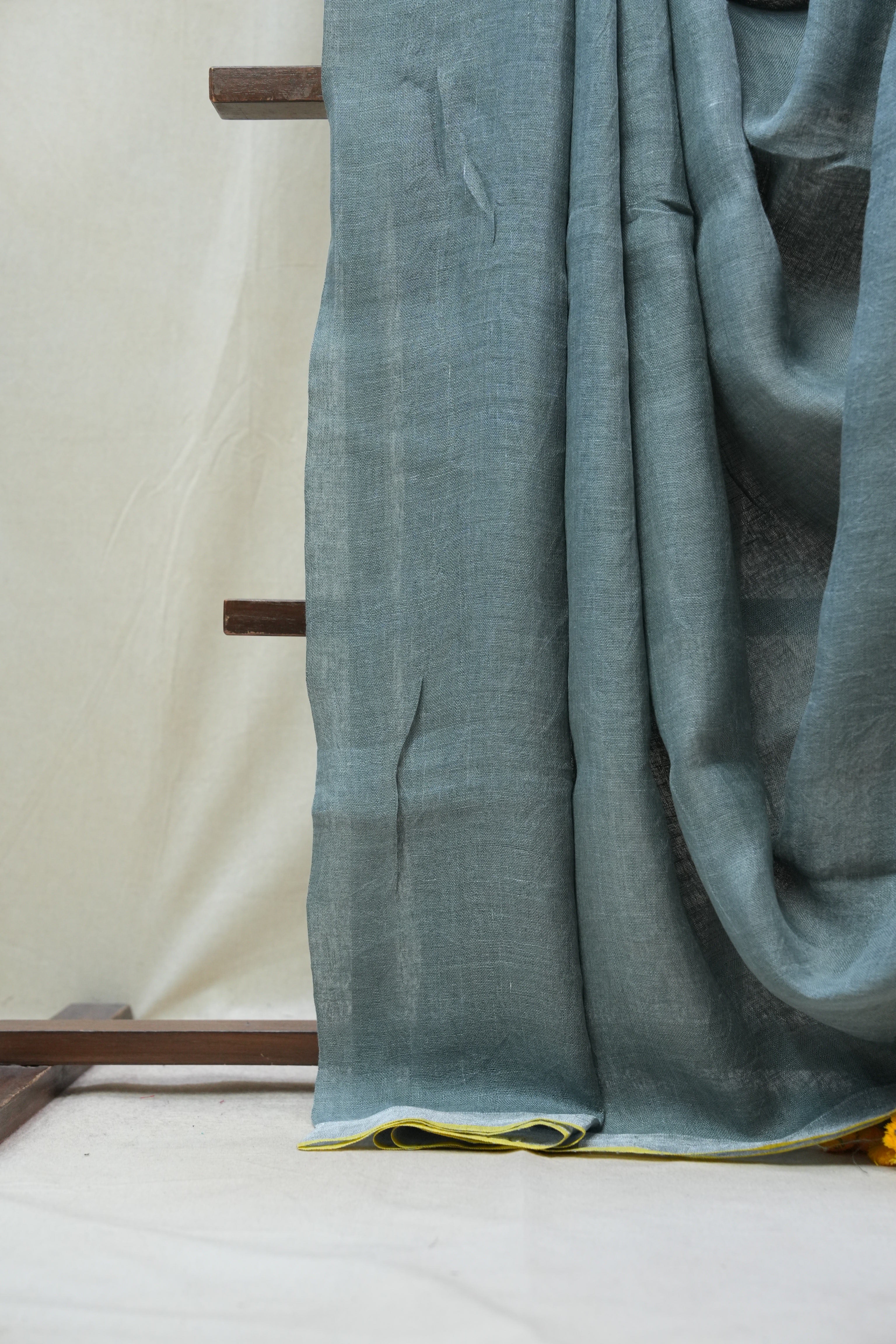 Olive Green Plain Linen Saree With Yellow Tassels - SROGPLS286