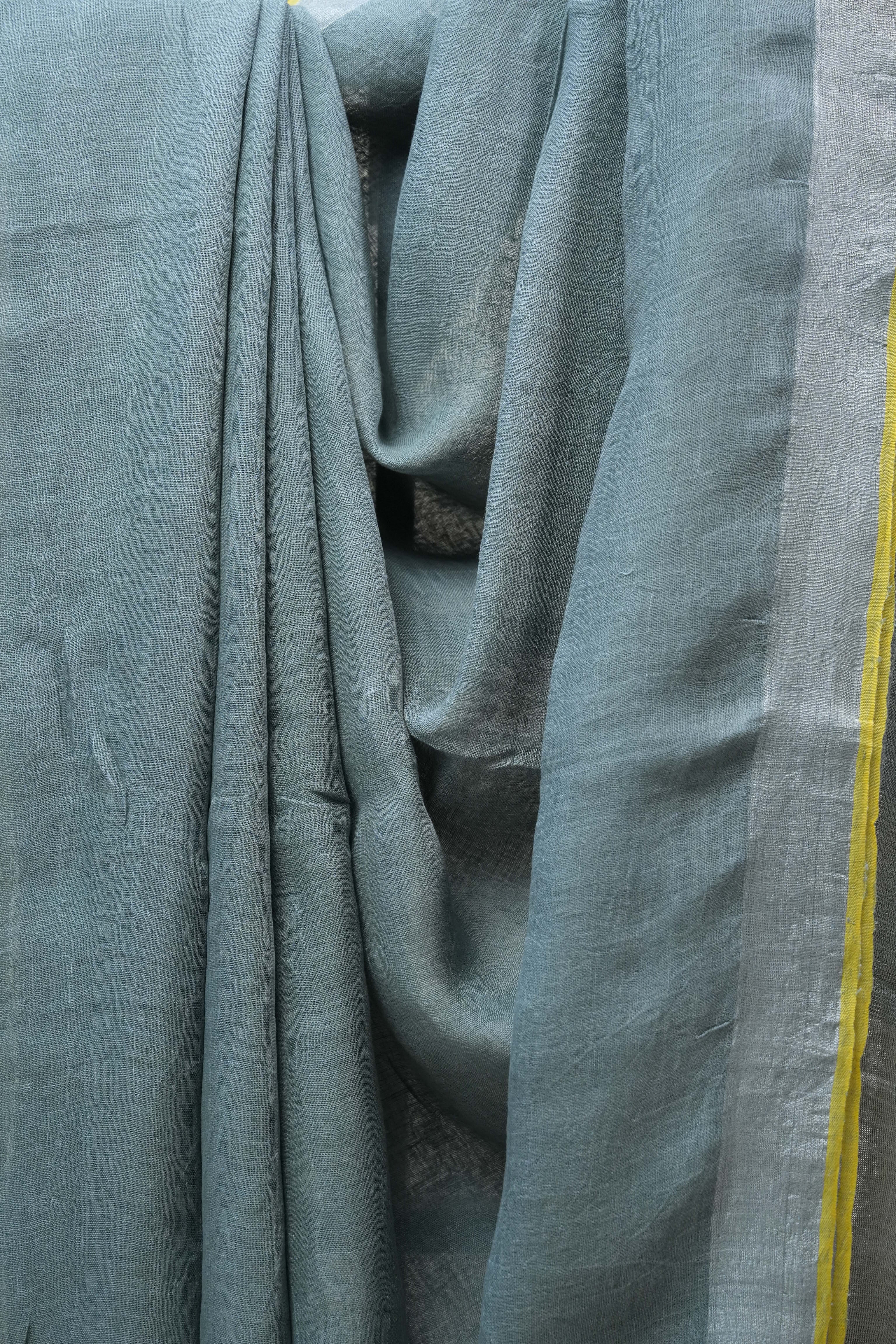 Olive Green Plain Linen Saree With Yellow Tassels - SROGPLS286