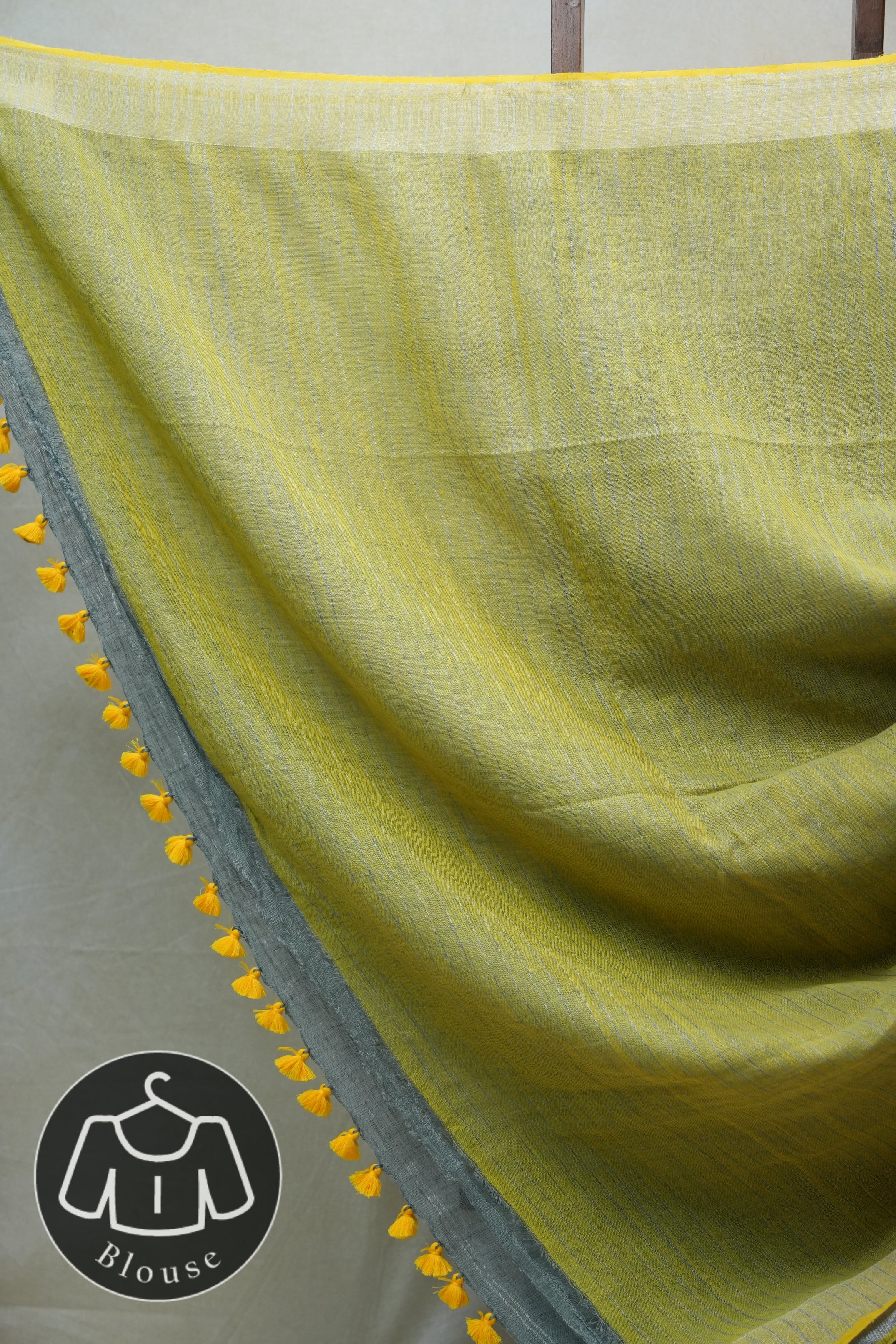 Olive Green Plain Linen Saree With Yellow Tassels - SROGPLS286