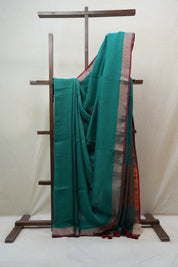 Green Plain Linen Saree With Red Tassels - SRGPLS284